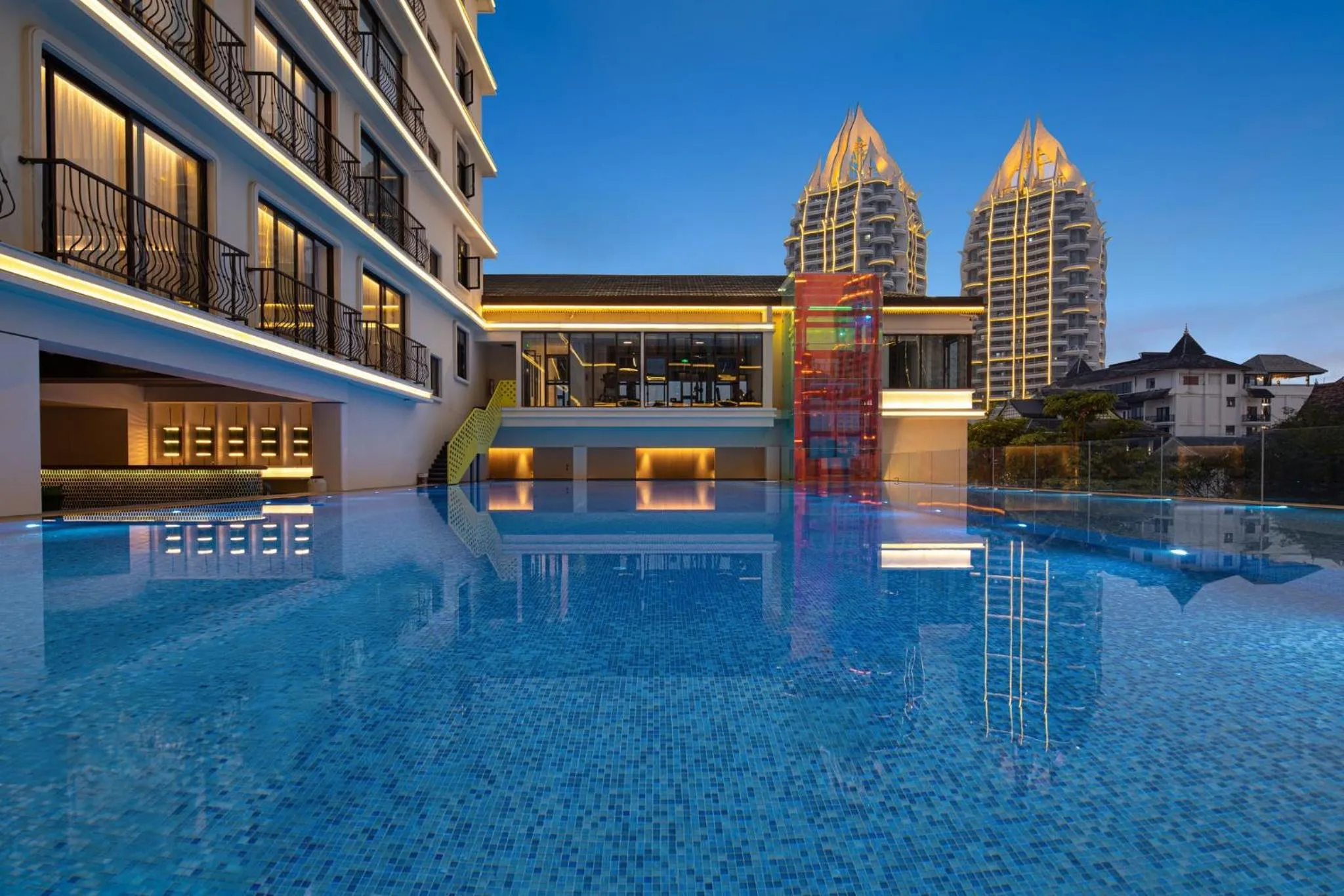 Swimming pool in voco Xishuangbanna Gaozhuang by IHG