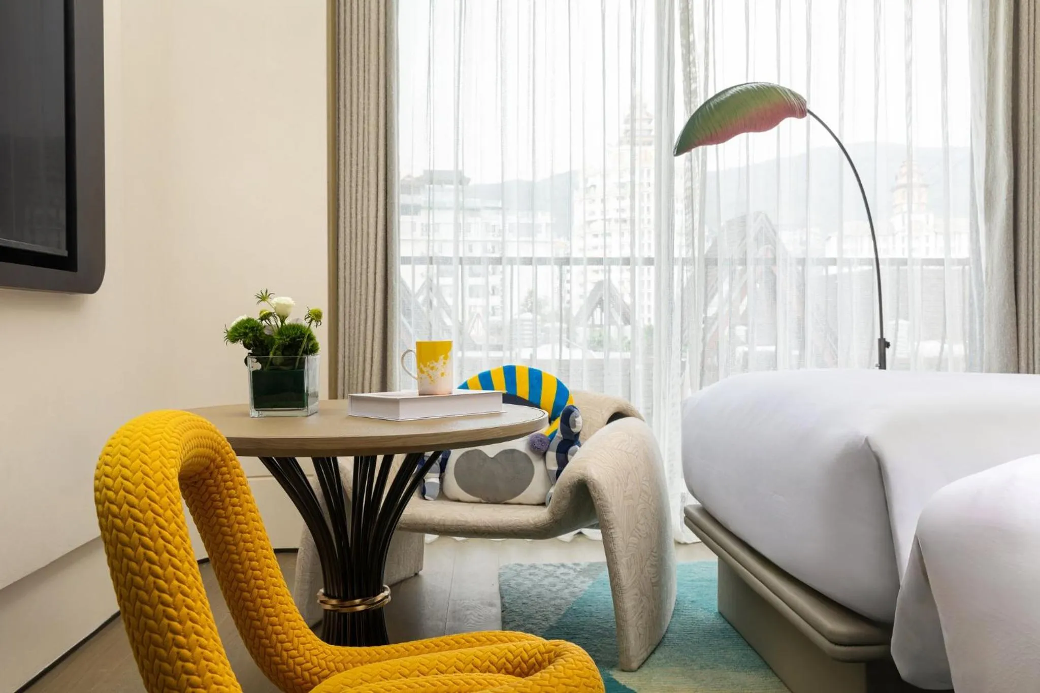 Photo of the whole room, Bed in voco Xishuangbanna Gaozhuang by IHG