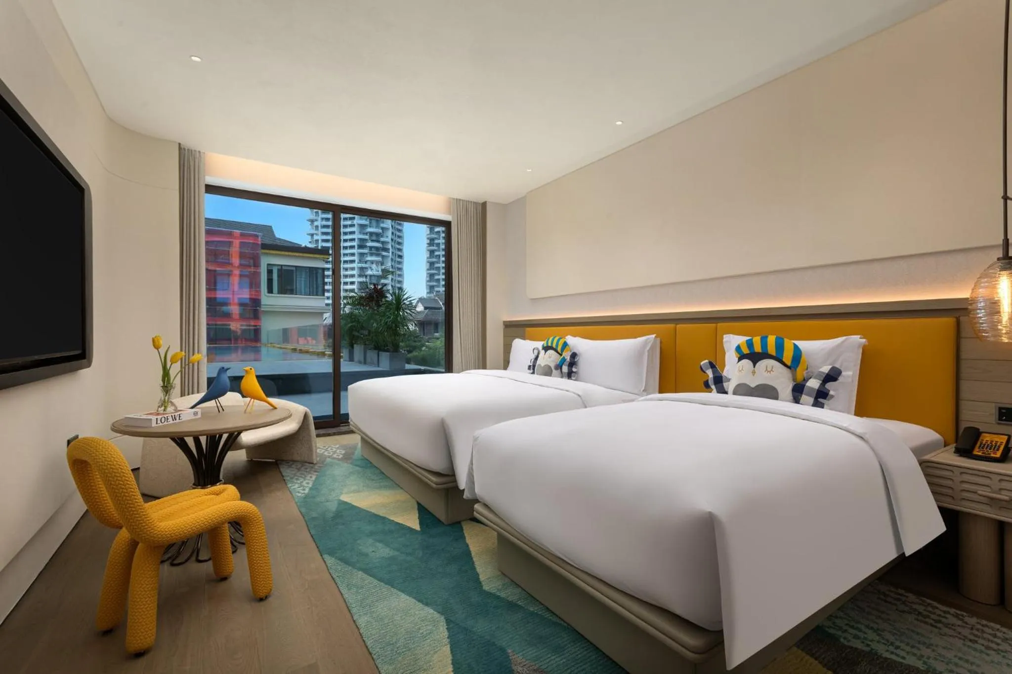 Photo of the whole room, Bed in voco Xishuangbanna Gaozhuang by IHG