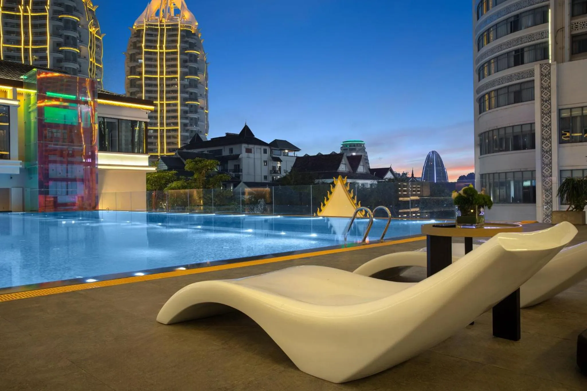 Swimming pool in voco Xishuangbanna Gaozhuang by IHG