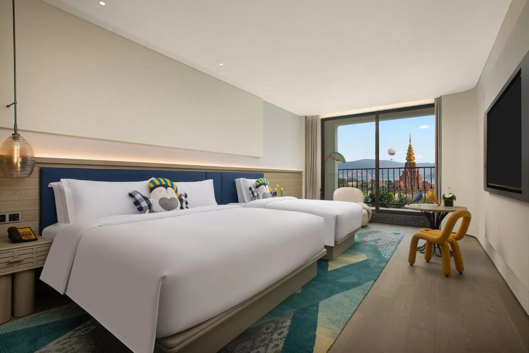 Photo of the whole room, Bed in voco Xishuangbanna Gaozhuang by IHG