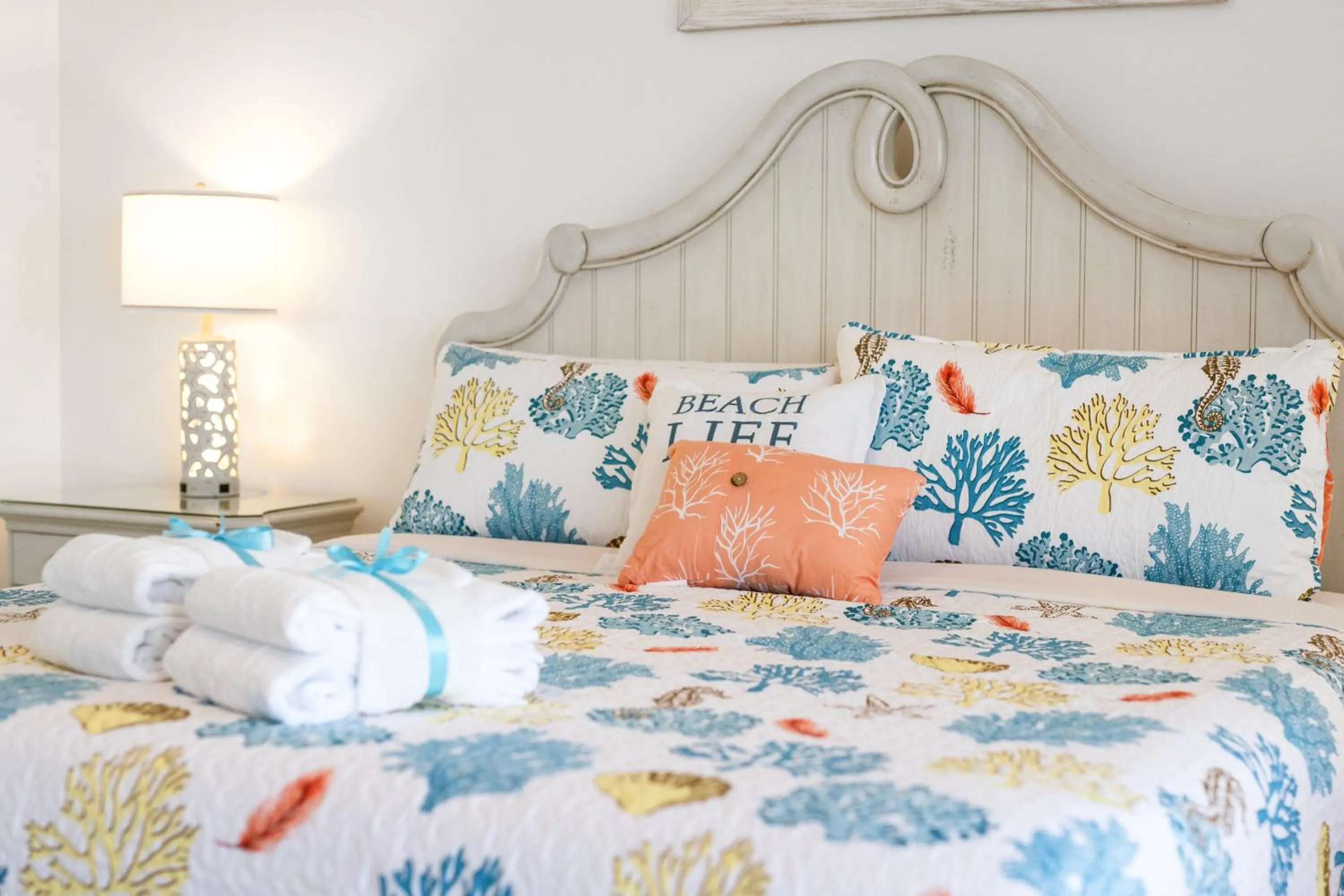 Bed in Treasure Shores–3BR Beachfront Corner Unit sleeps 8 with Stunning Gulf Views!