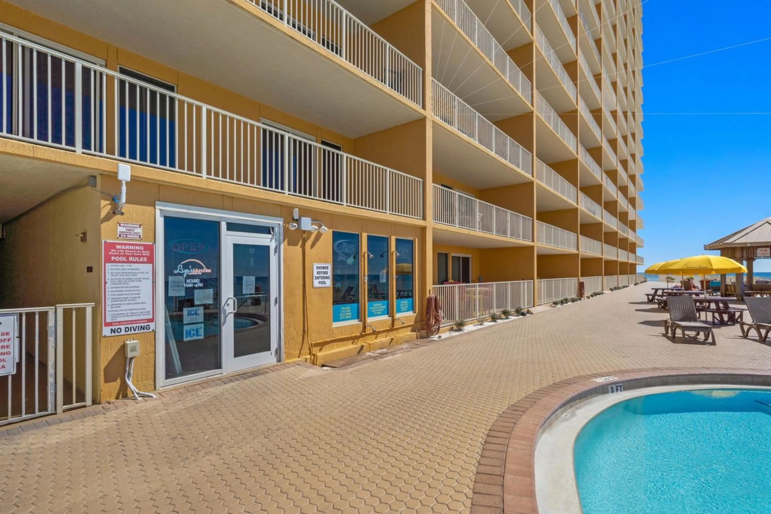 Property building in Treasure Shores–3BR Beachfront Corner Unit sleeps 8 with Stunning Gulf Views!