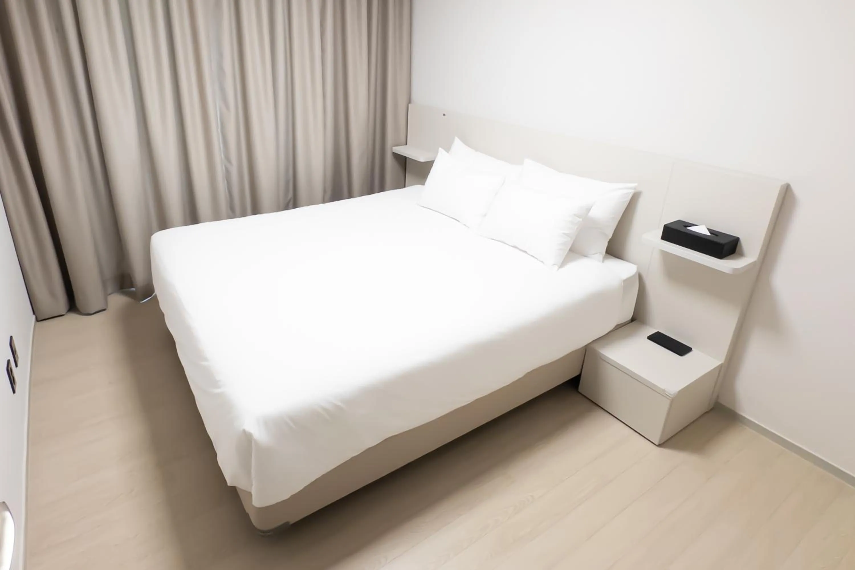 Bed in Hotel Wavellent Yangyang