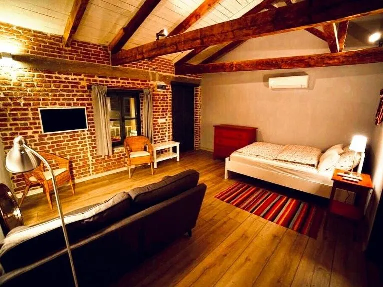 Bed in Attalos Suites Hotel