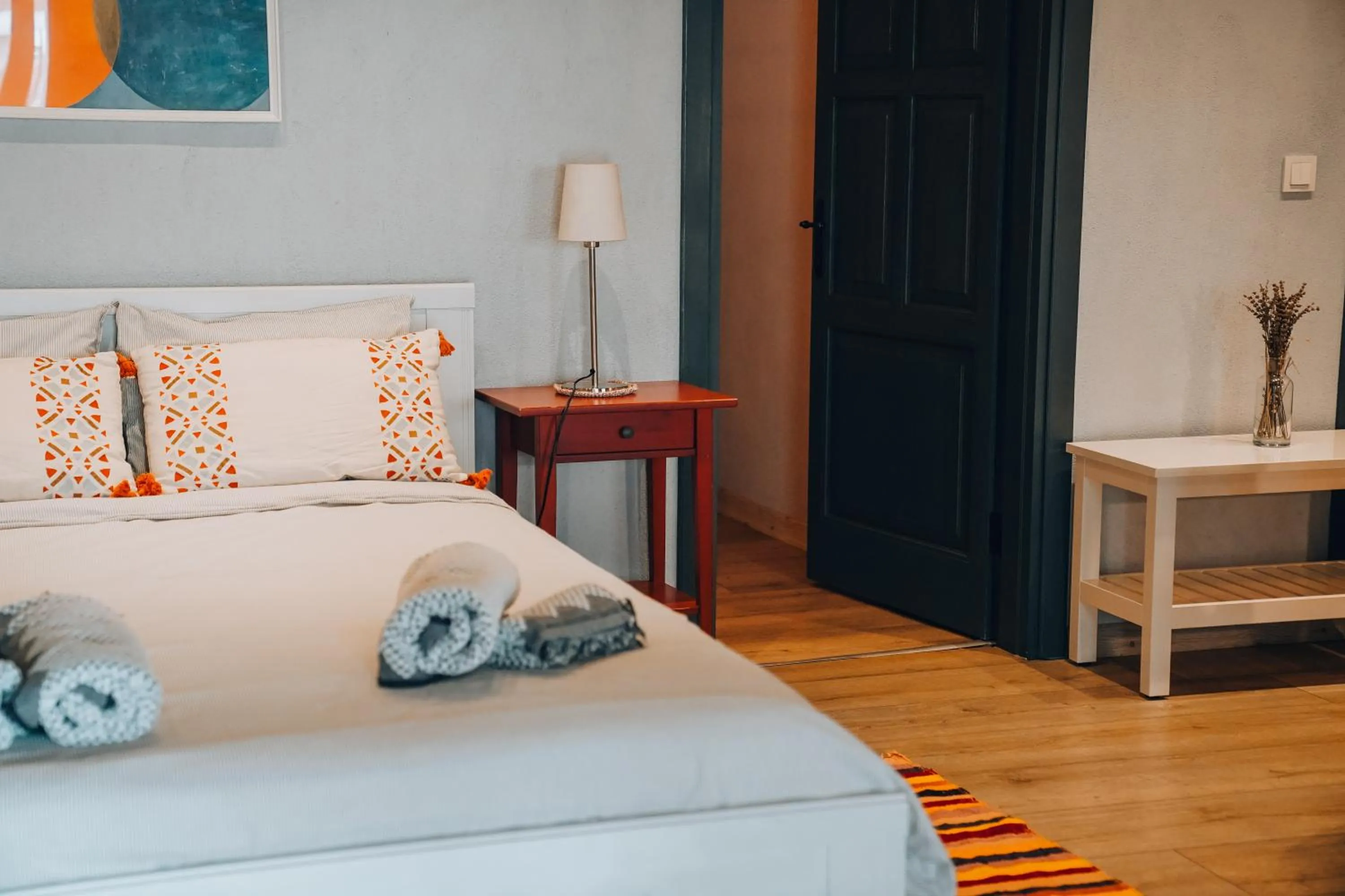 Bed in Attalos Suites Hotel