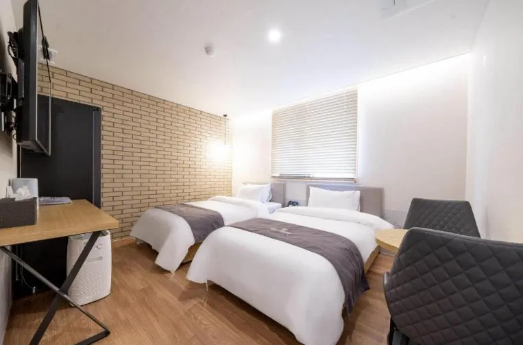 Bed in Hotel 7 Bricks Gwangju Sangmu