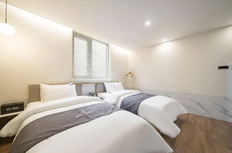 Bed in Hotel 7 Bricks Gwangju Sangmu