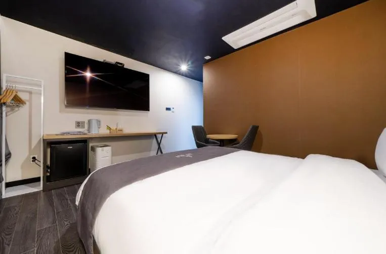 Bed in Hotel 7 Bricks Gwangju Sangmu