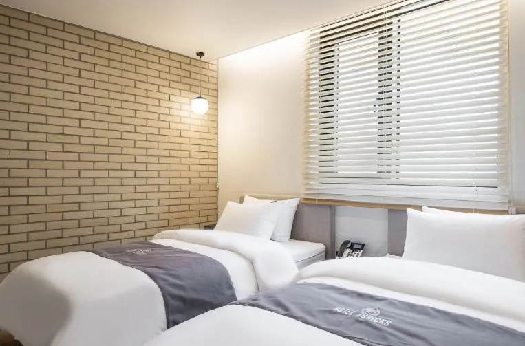 Bed in Hotel 7 Bricks Gwangju Sangmu