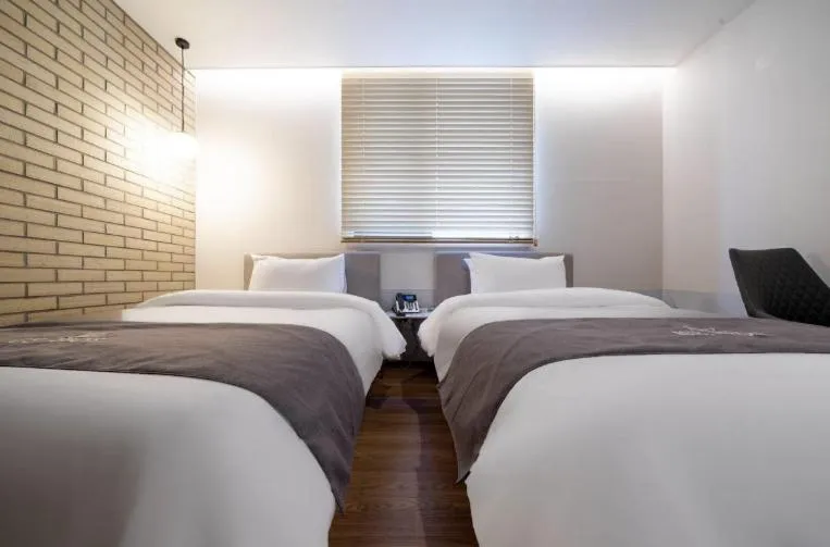 Bed in Hotel 7 Bricks Gwangju Sangmu
