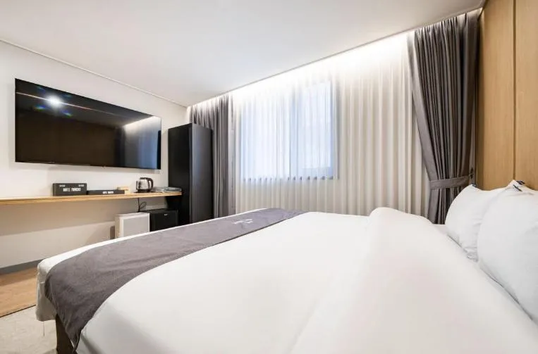 Bed in Hotel 7 Bricks Gwangju Sangmu