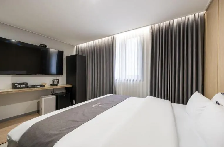 Bed in Hotel 7 Bricks Gwangju Sangmu