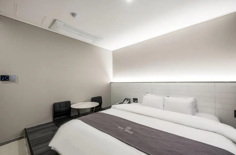 Bed in Hotel 7 Bricks Gwangju Sangmu