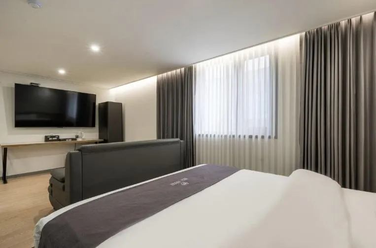 Bed in Hotel 7 Bricks Gwangju Sangmu