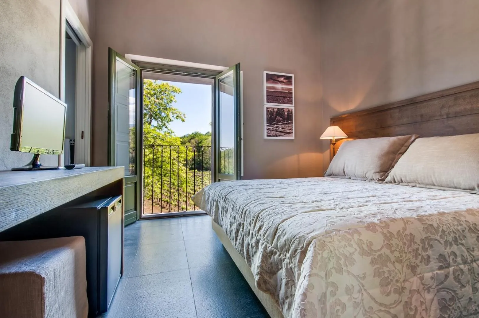 Bed in Firriato Hospitality Cavanera Etnea Resort & Wine Experience