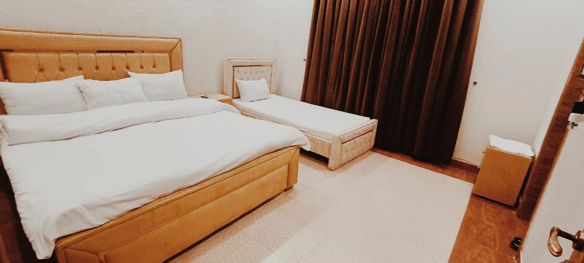 Bed in Morbex Inn Hotel Islamabad