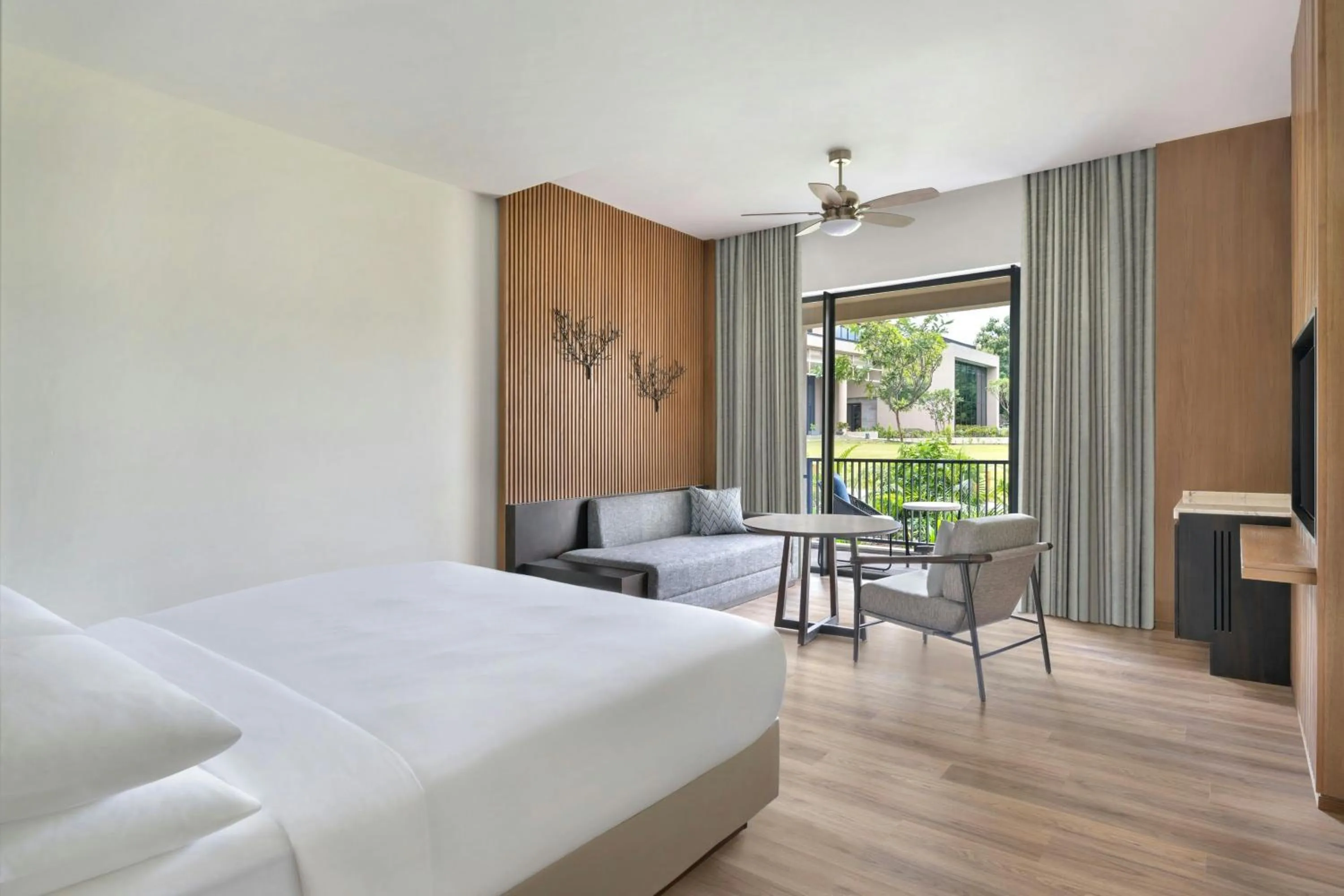 Photo of the whole room, Bed in Jim Corbett Marriott Resort & Spa