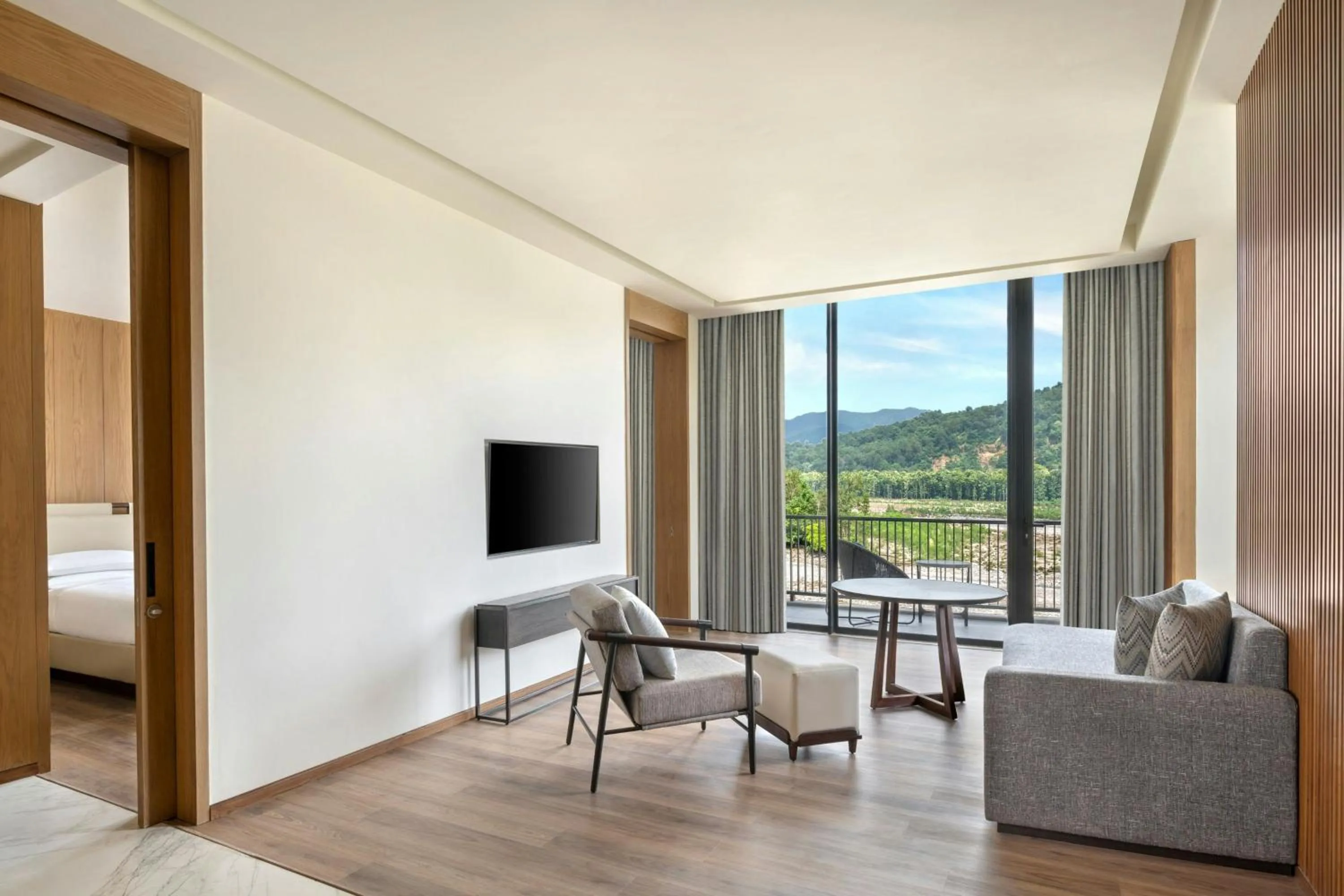 Photo of the whole room, Bed in Jim Corbett Marriott Resort & Spa