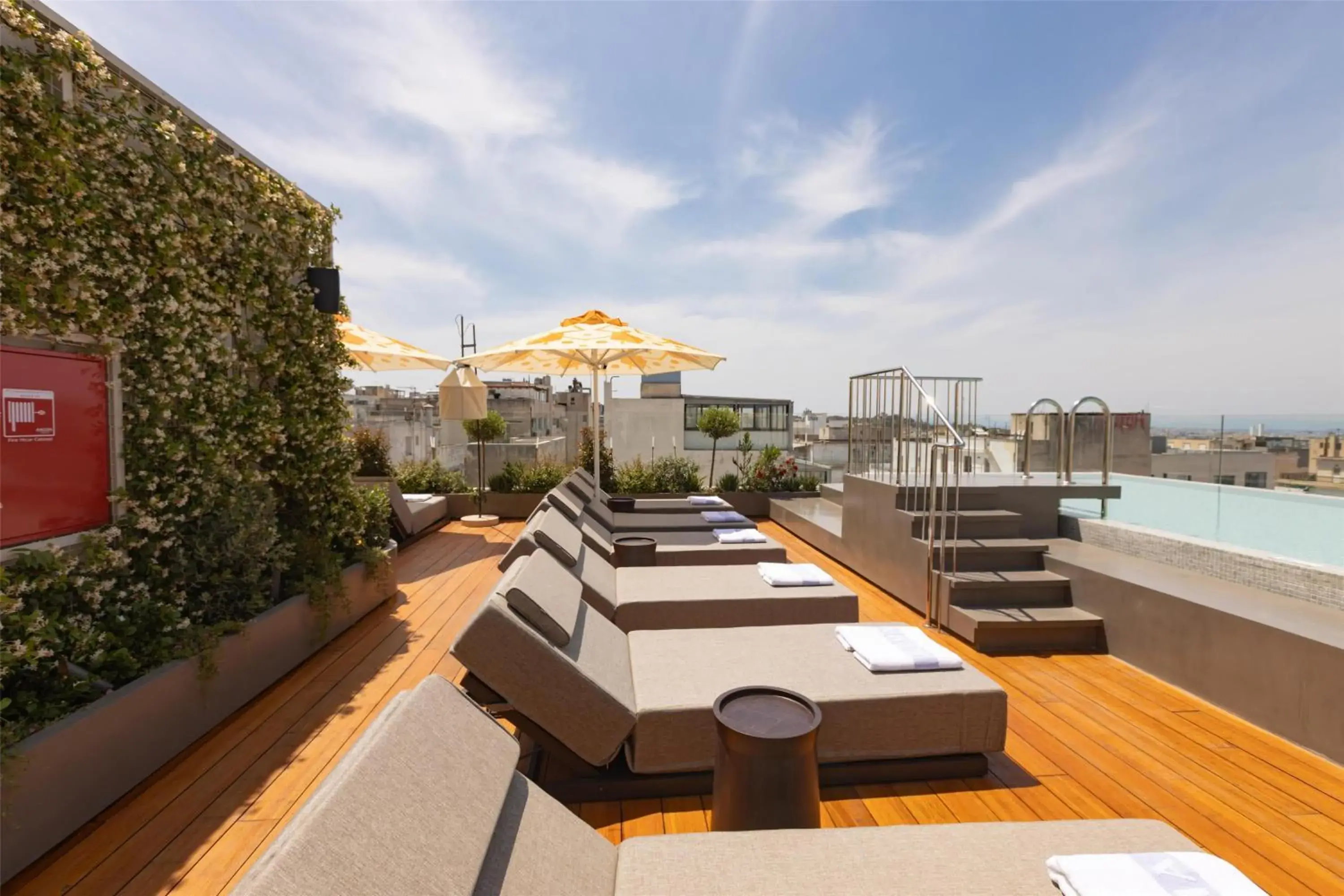 Pool view in Adia Aluma Athens, Curio Collection By Hilton Pool view in Adia Aluma Athens, Curio Collection By Hilton