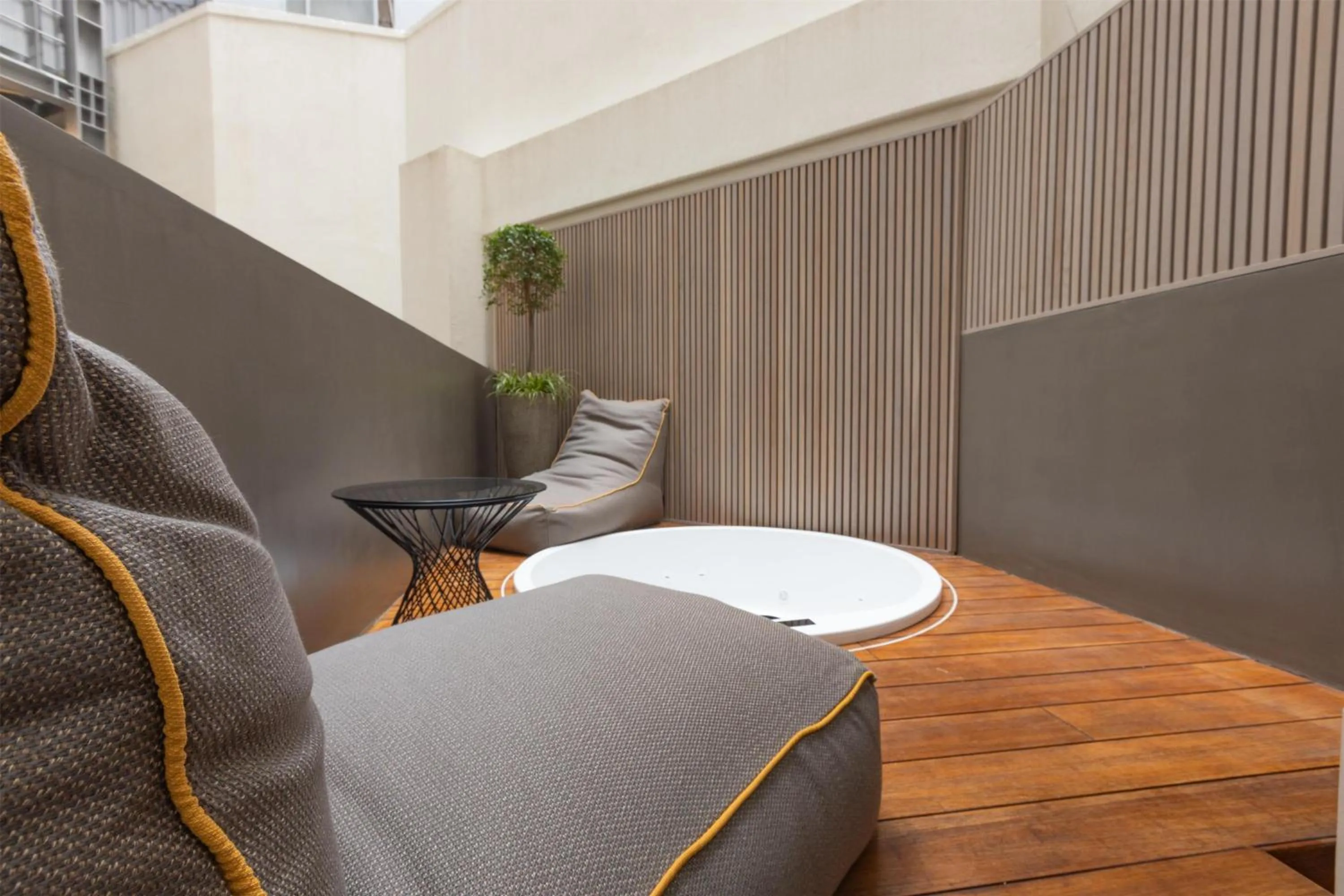 Living room in Adia Aluma Athens, Curio Collection By Hilton