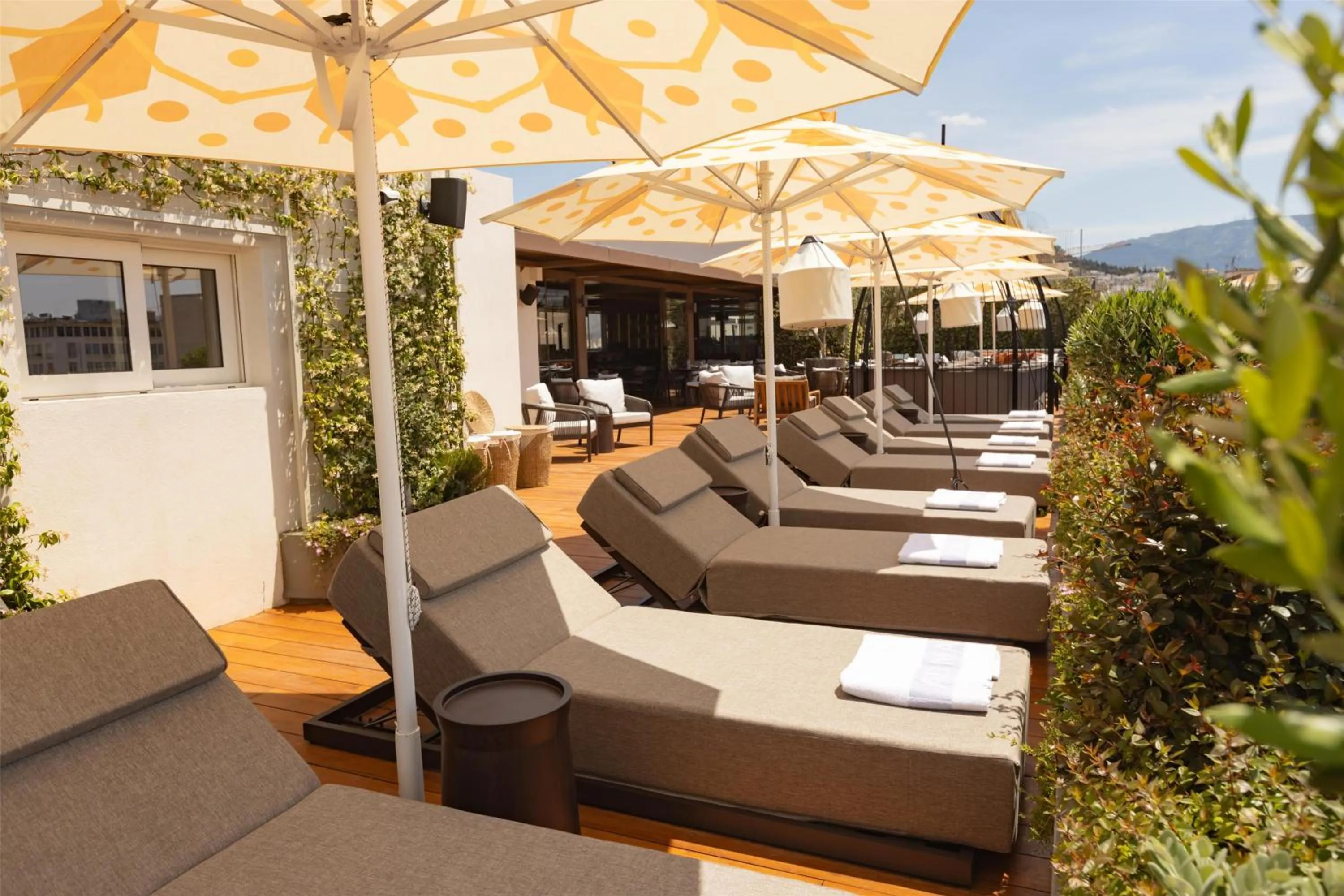 Patio in Adia Aluma Athens, Curio Collection By Hilton