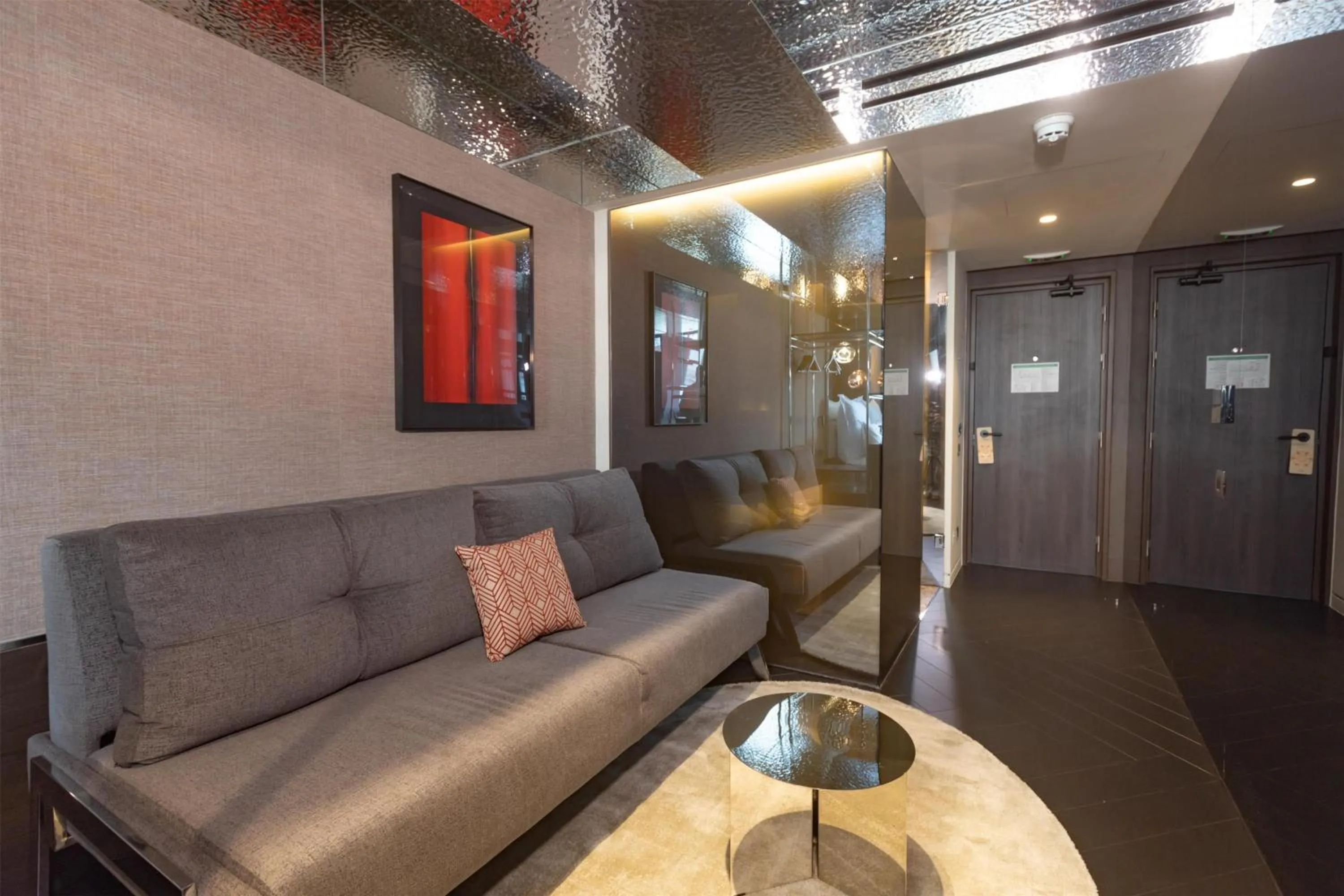 Living room in Adia Aluma Athens, Curio Collection By Hilton