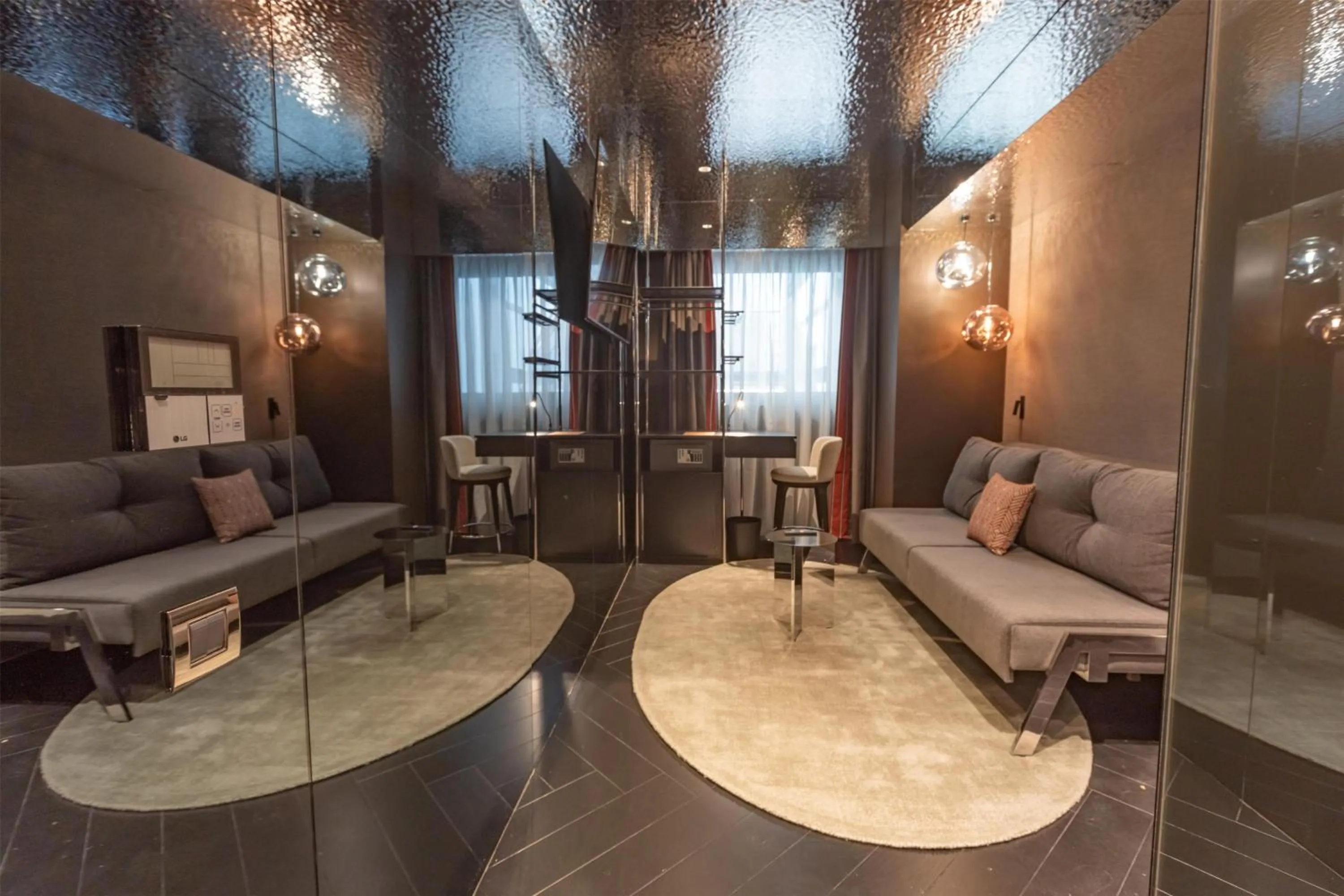 Living room in Adia Aluma Athens, Curio Collection By Hilton