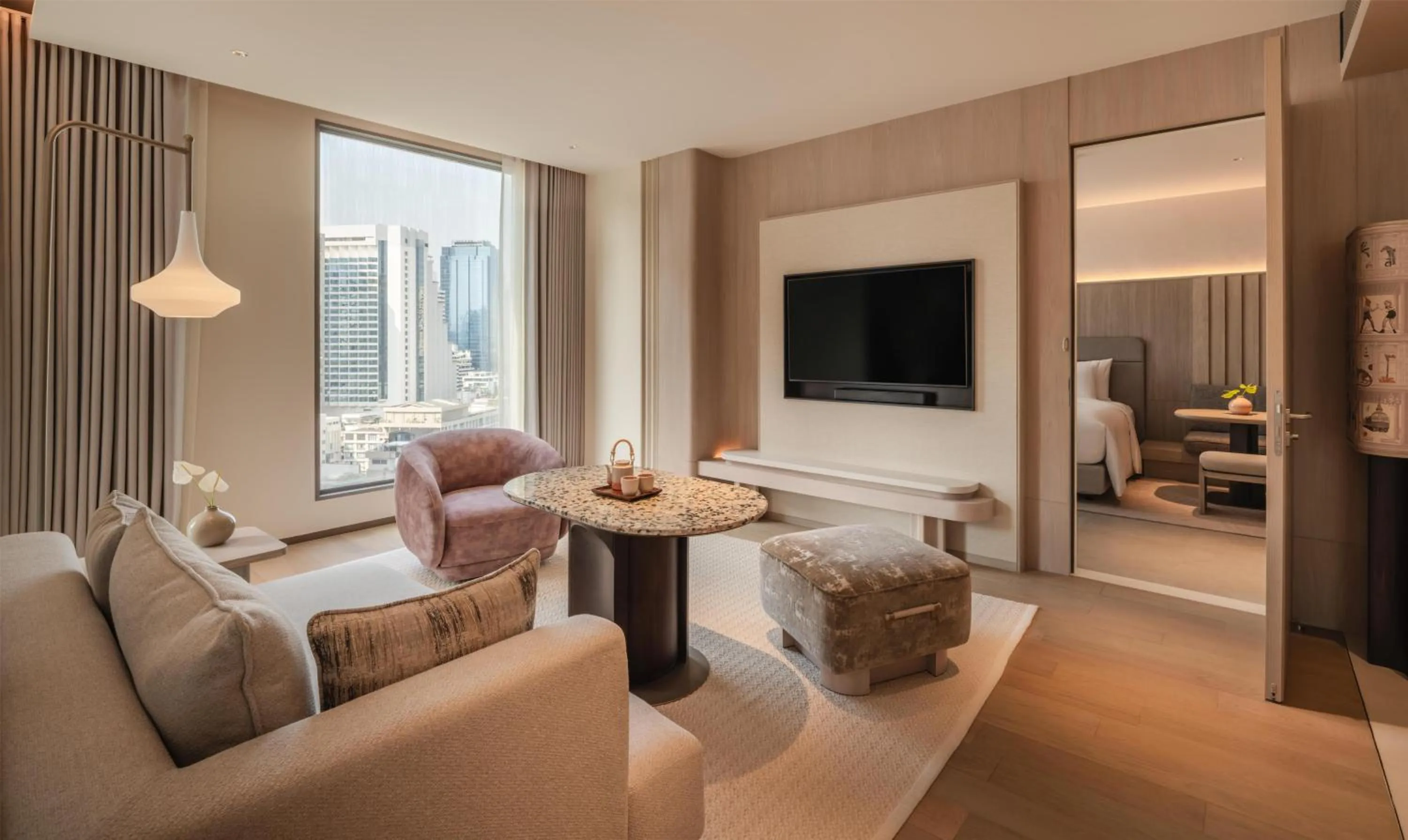 Living room in Kromo Bangkok, Curio Collection By Hilton