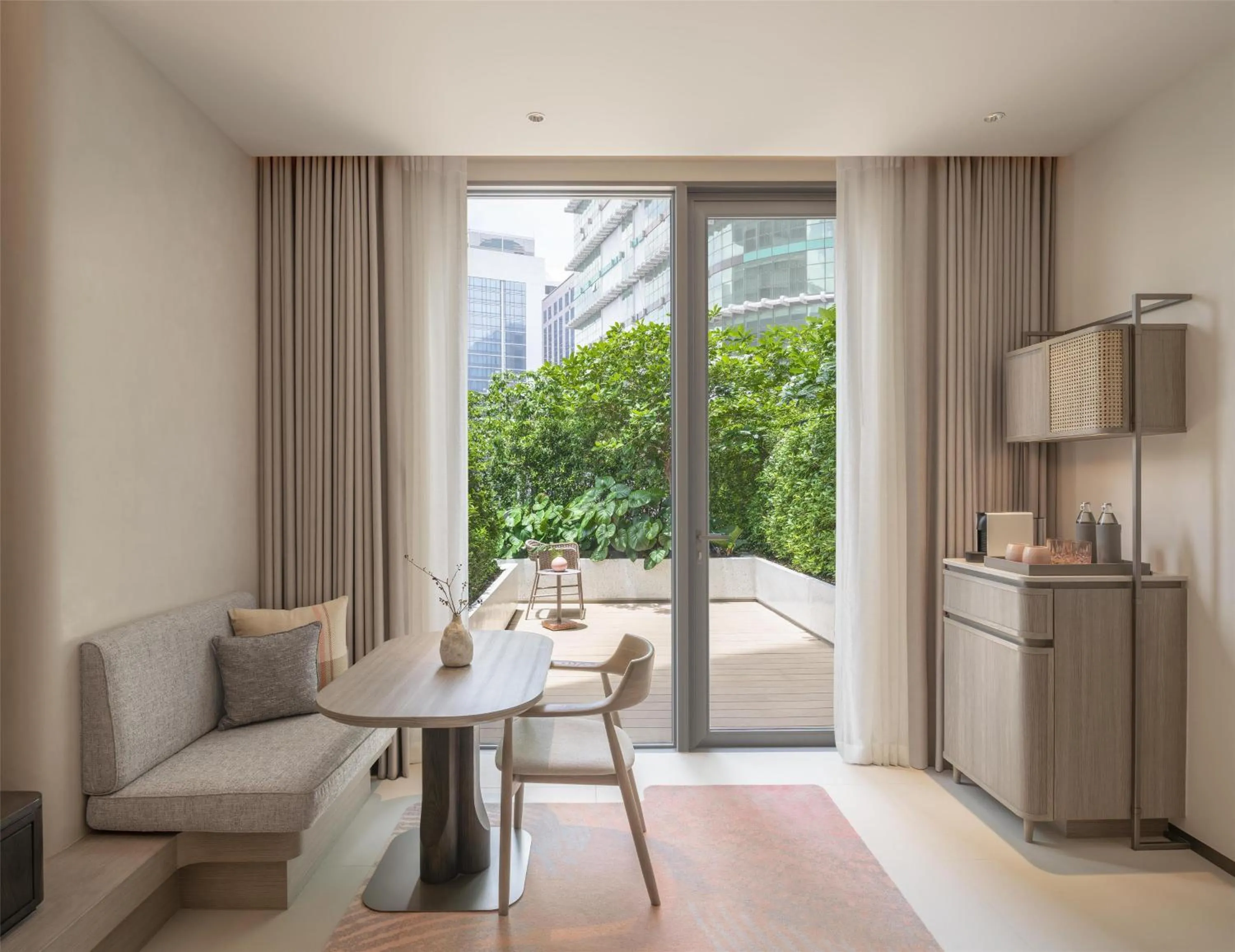 Living room in Kromo Bangkok, Curio Collection By Hilton