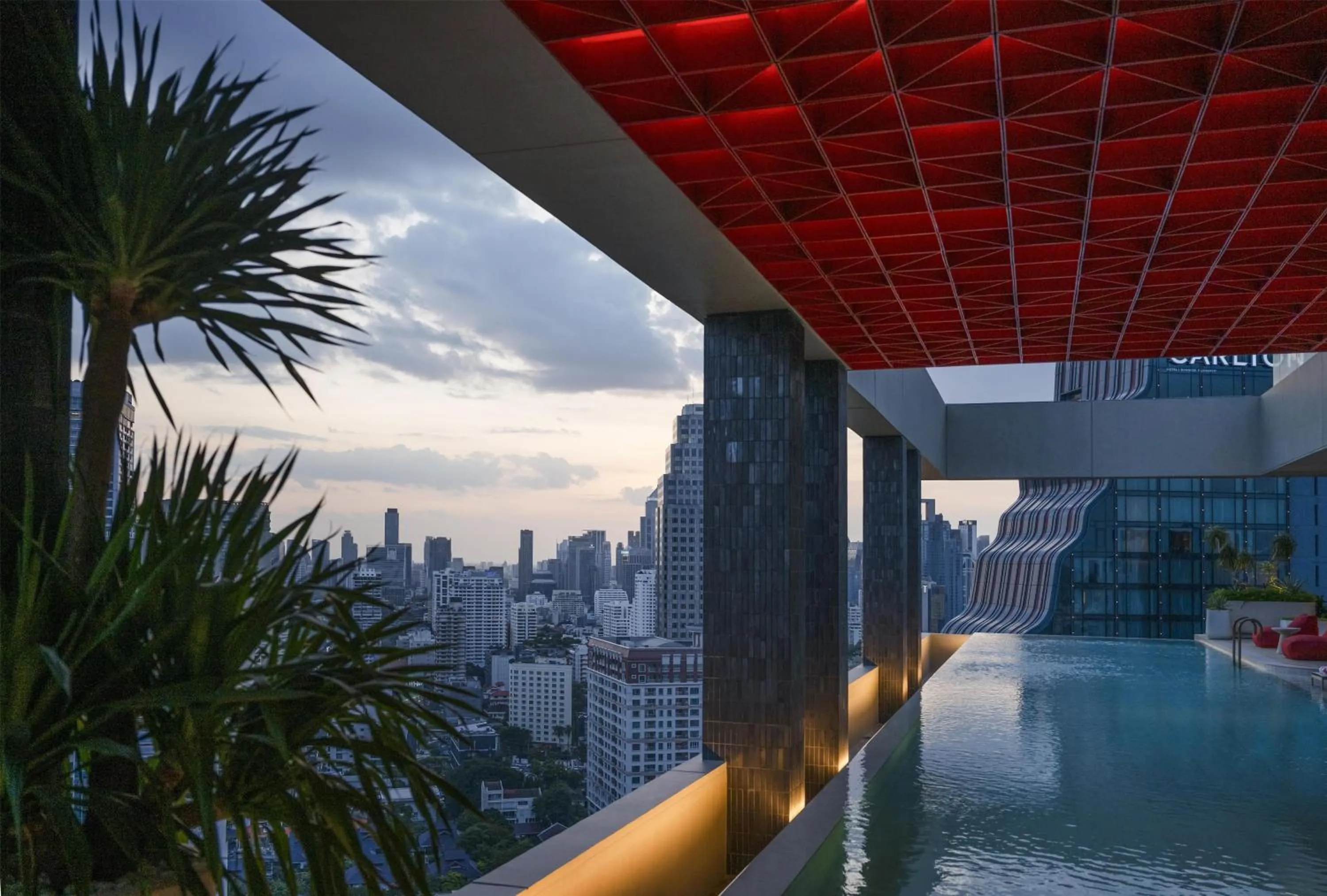 Pool view in Kromo Bangkok, Curio Collection By Hilton