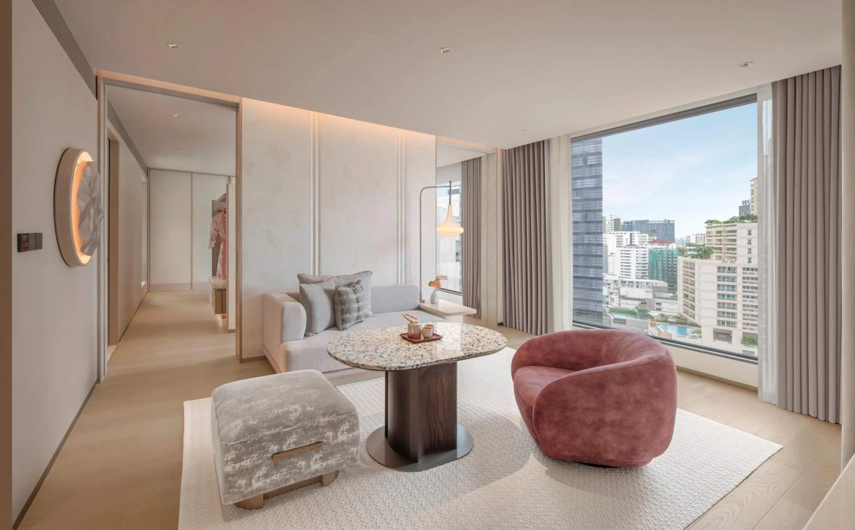 Living room in Kromo Bangkok, Curio Collection By Hilton