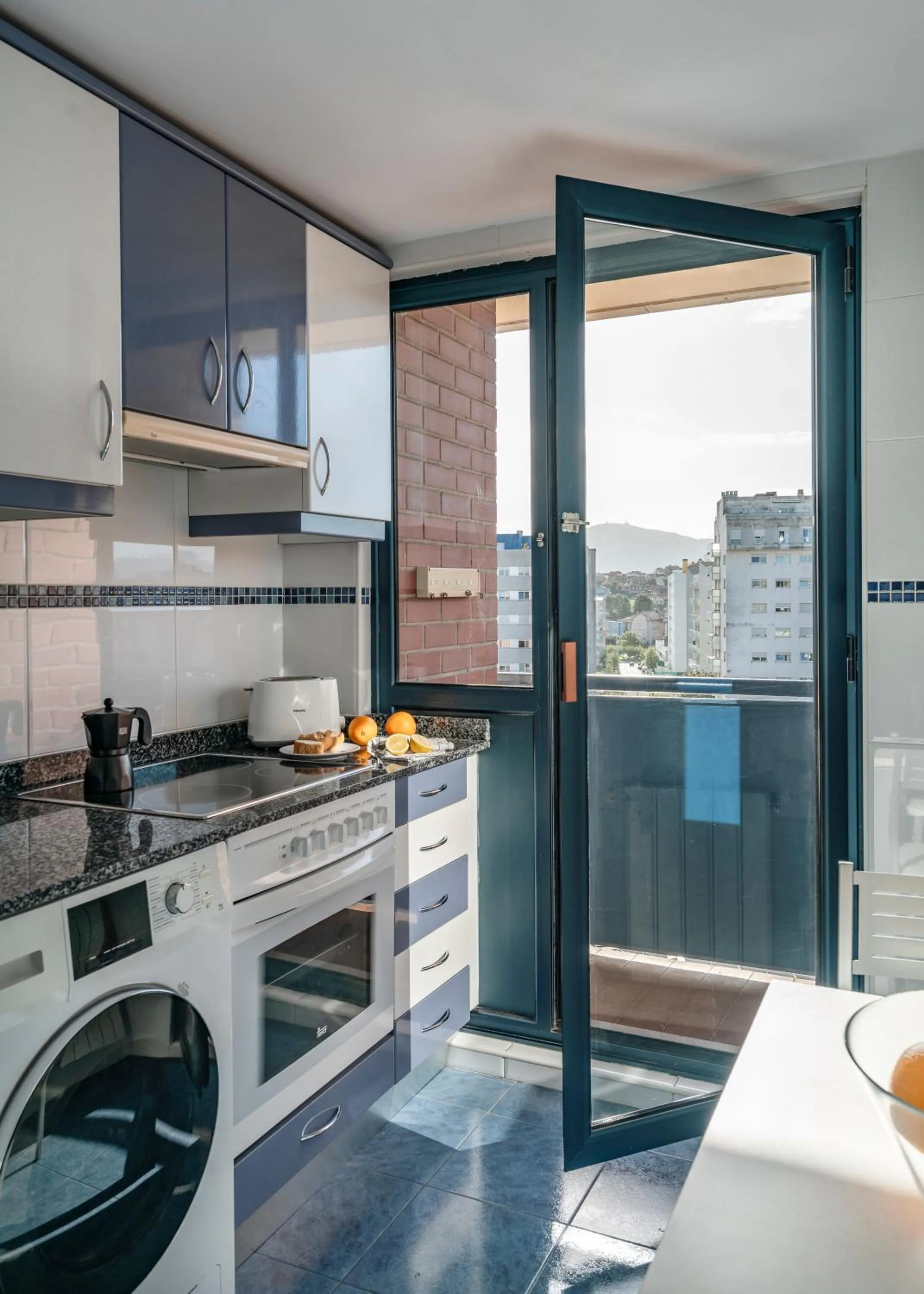 Kitchen or kitchenette in Apartamentos Alday