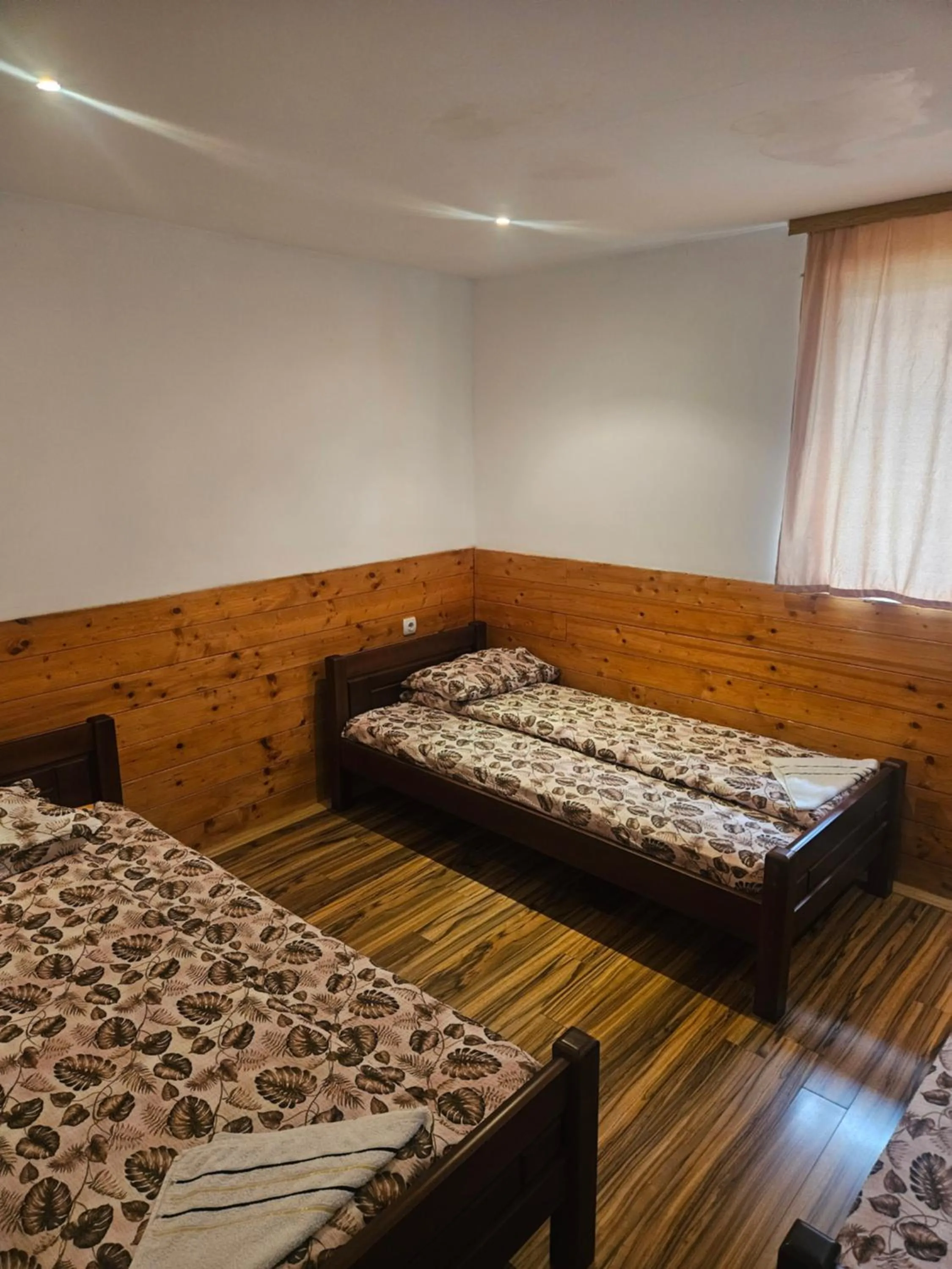Triple Room with Shared Bathroom in Guest House Ethno Village Milogora