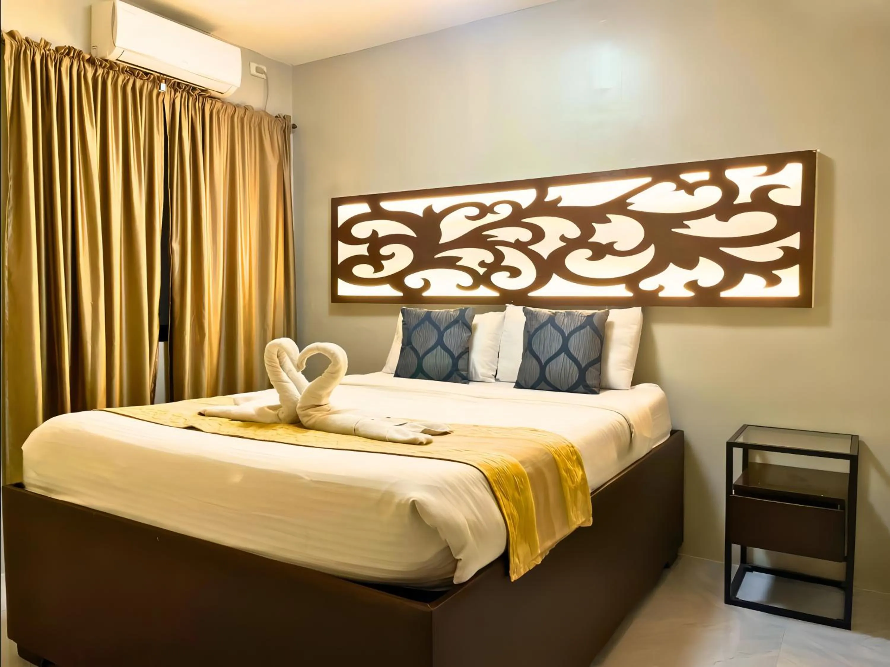 Bed in Algers Suites