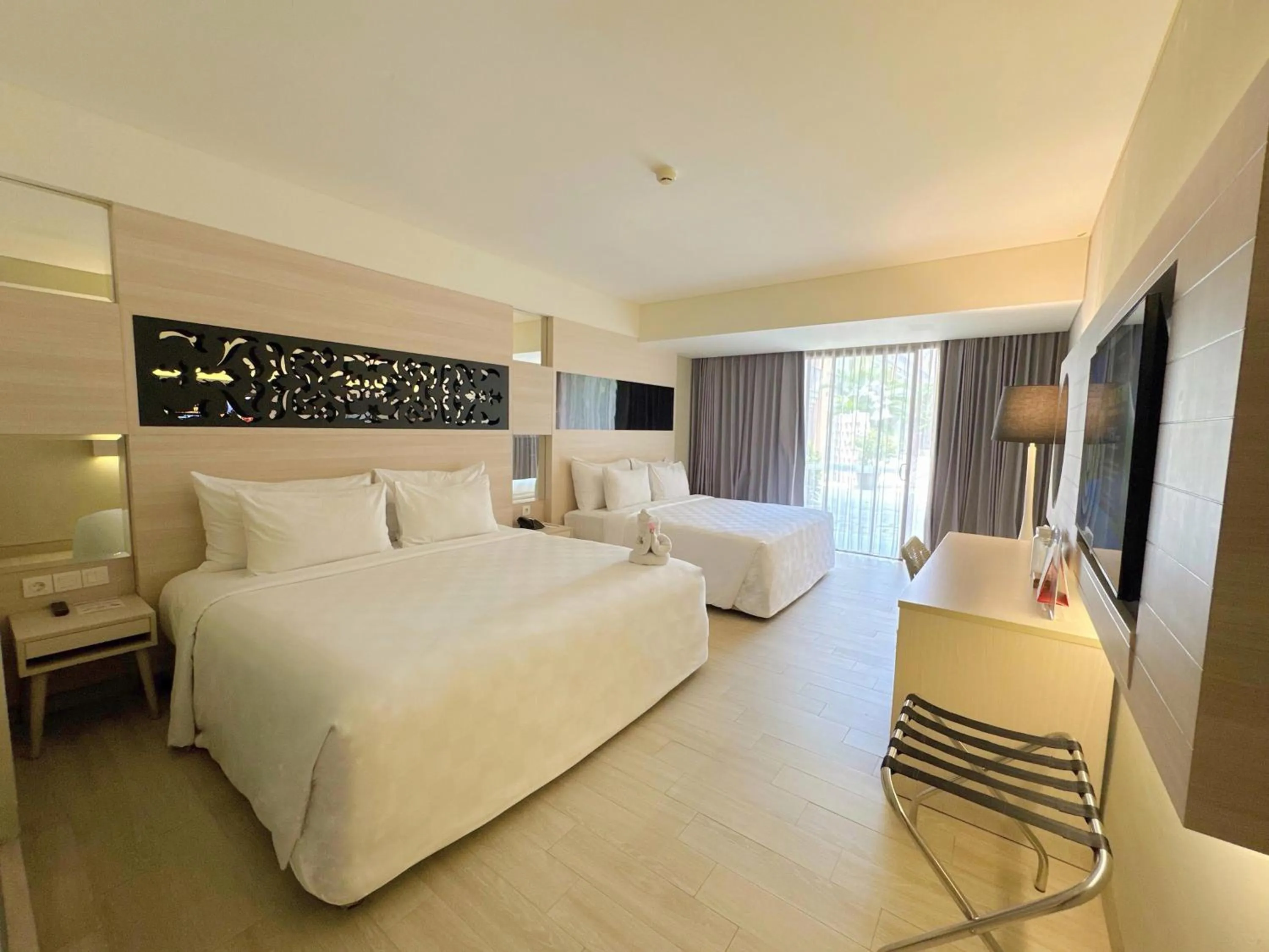 Bed in Swiss-Belhotel Tuban Bali