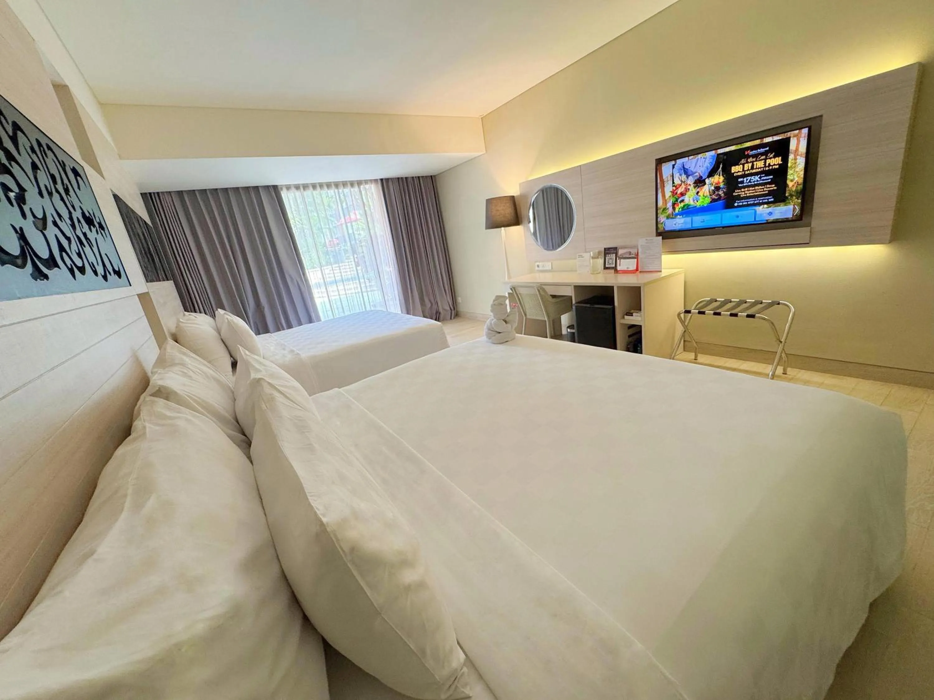 Bed in Swiss-Belhotel Tuban Bali