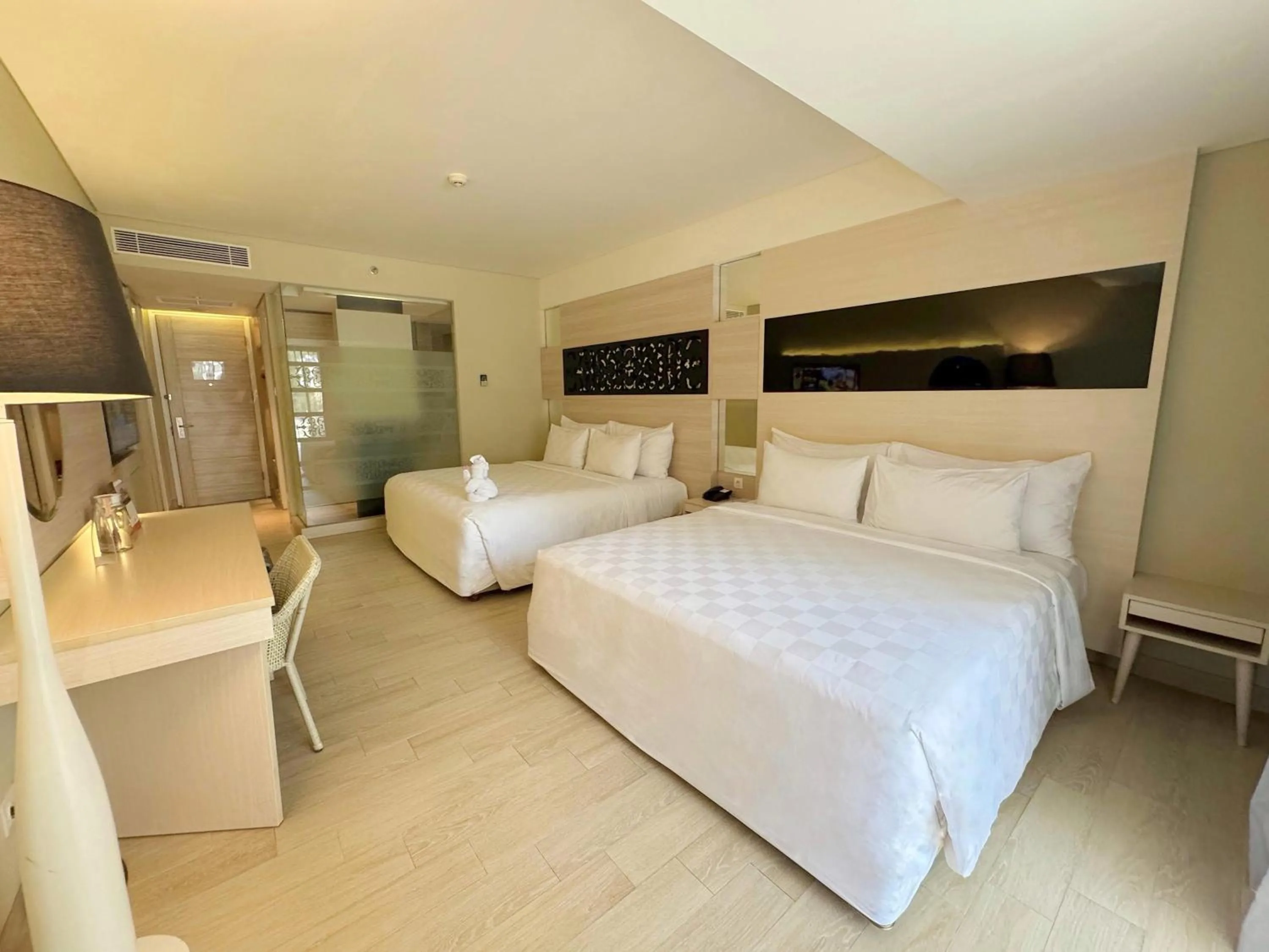 Bed in Swiss-Belhotel Tuban Bali