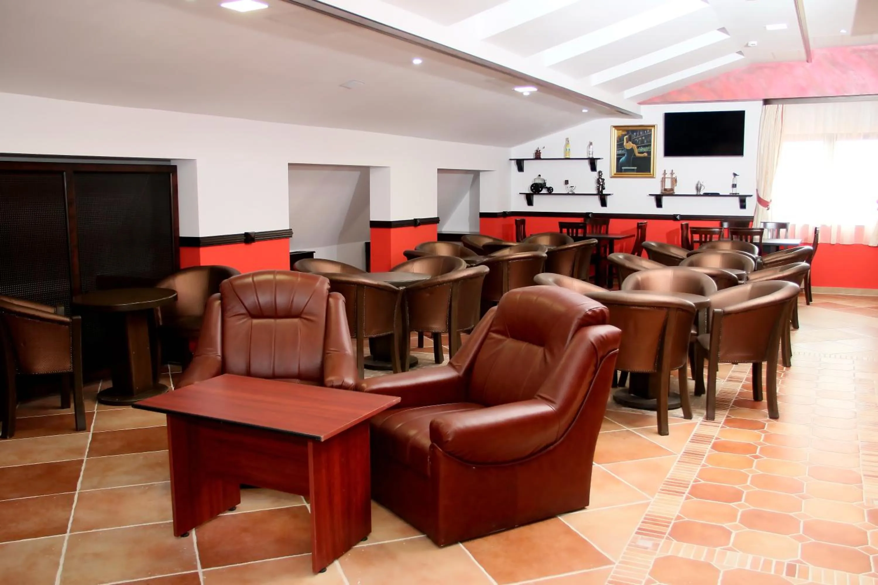 Communal lounge/ TV room in Hotel Exclusiv