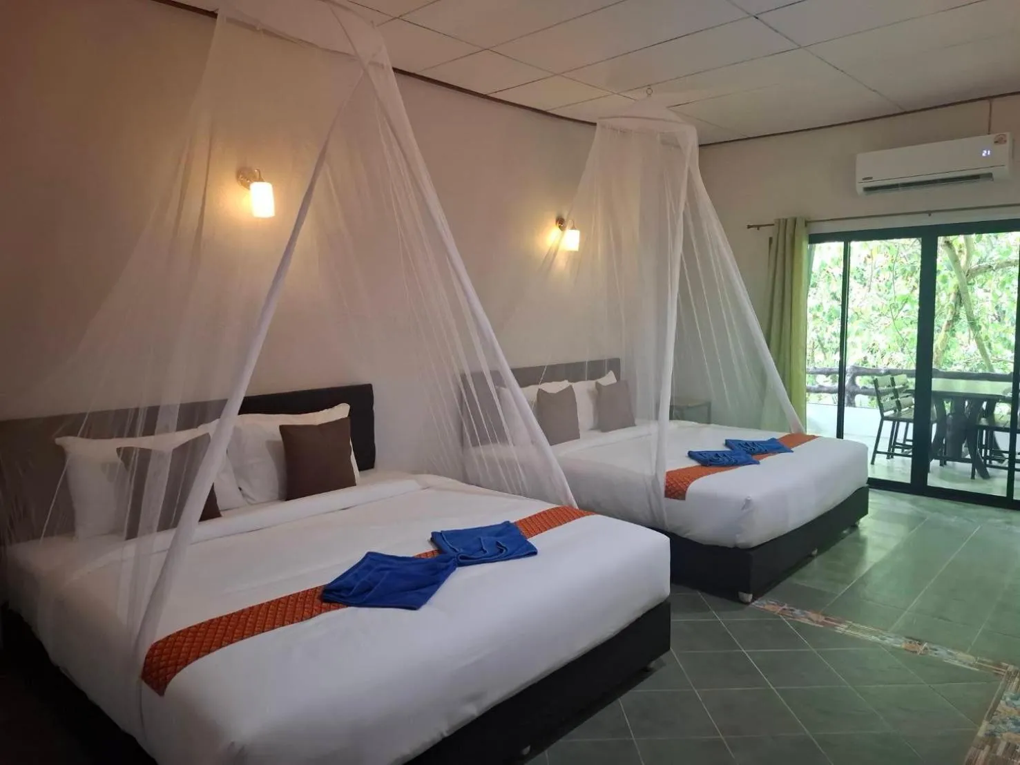 Bed in Tree Tops River Huts