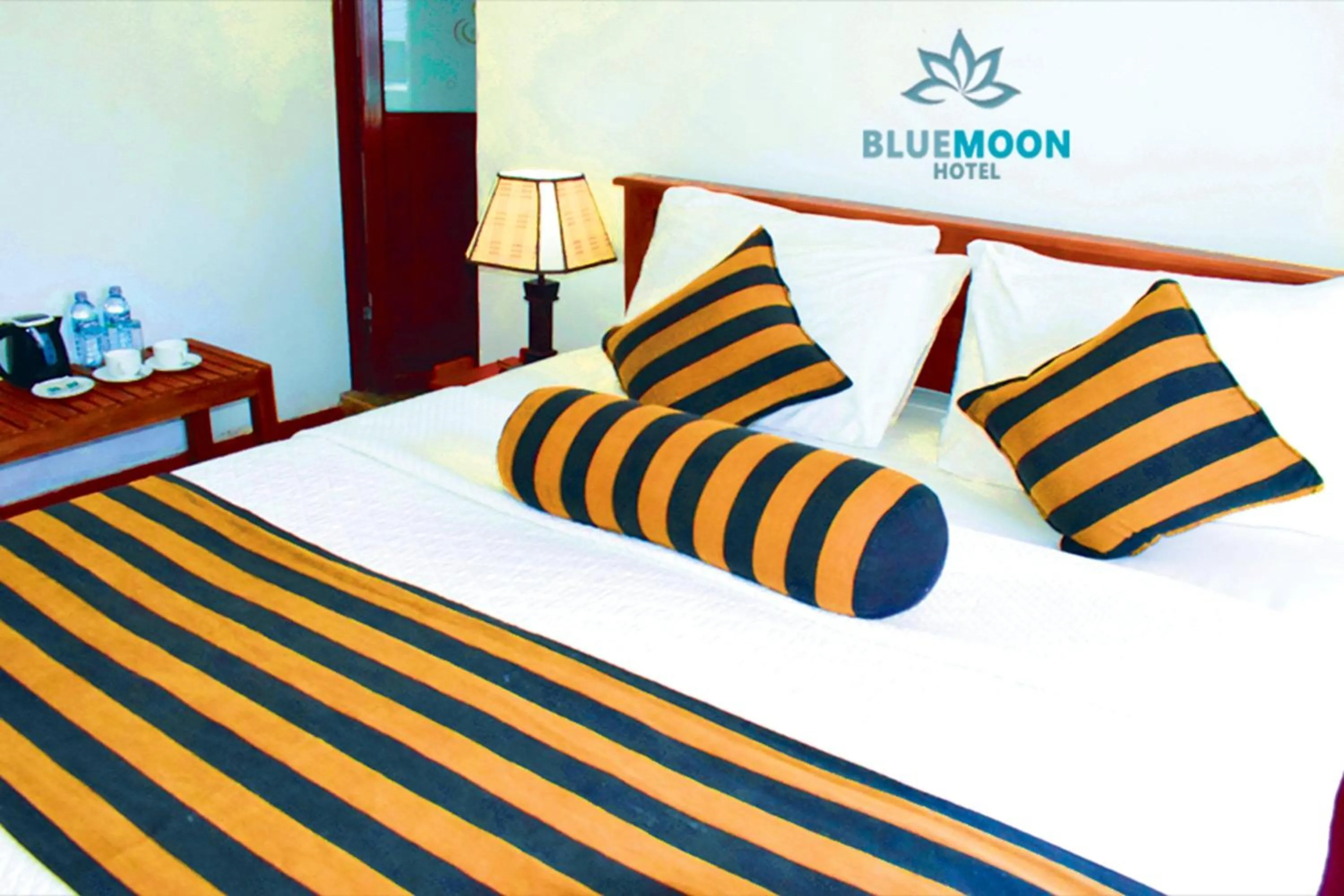 Bed in Blue Moon Hotel