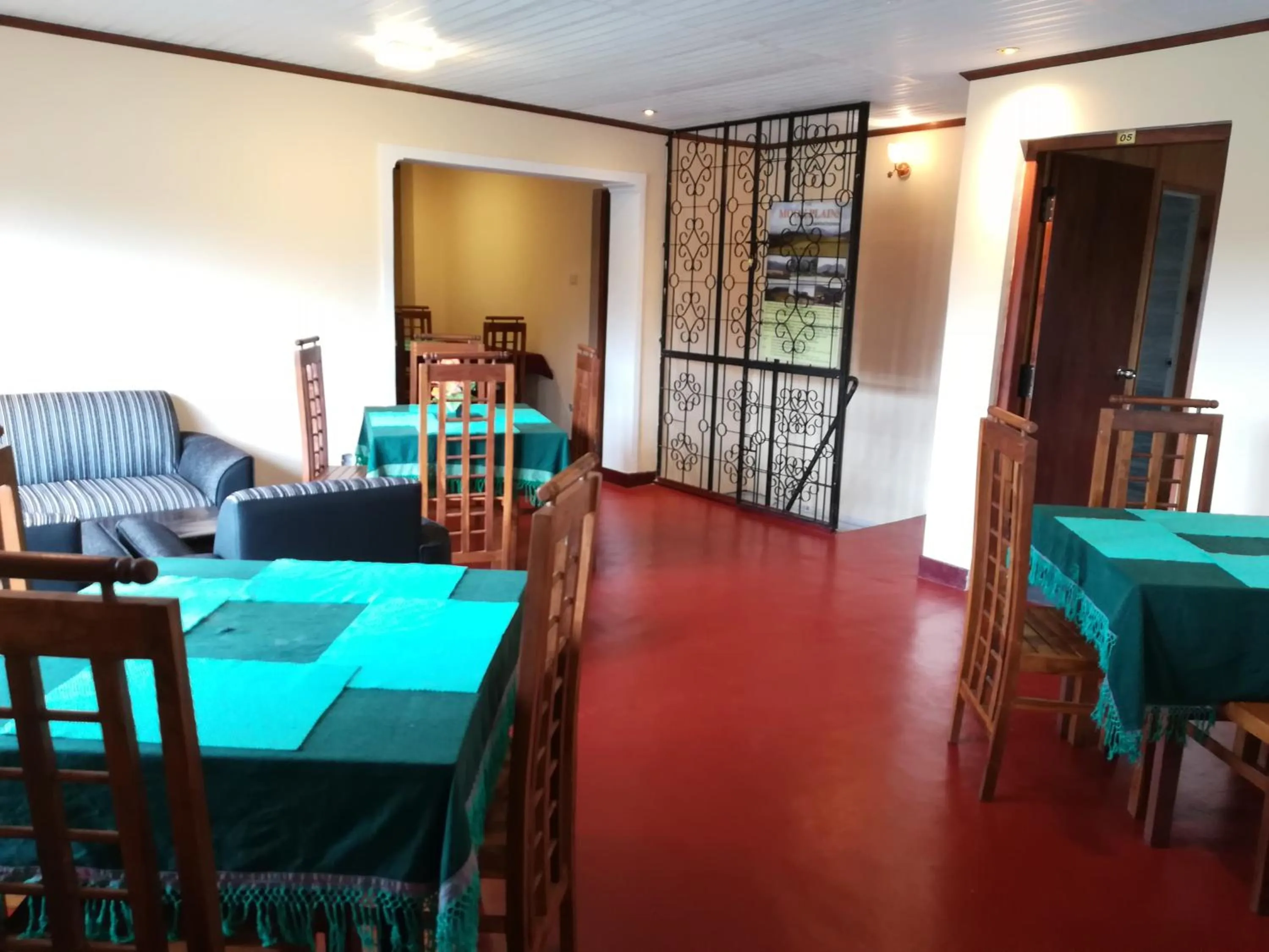 Communal lounge/ TV room in Blue Moon Hotel