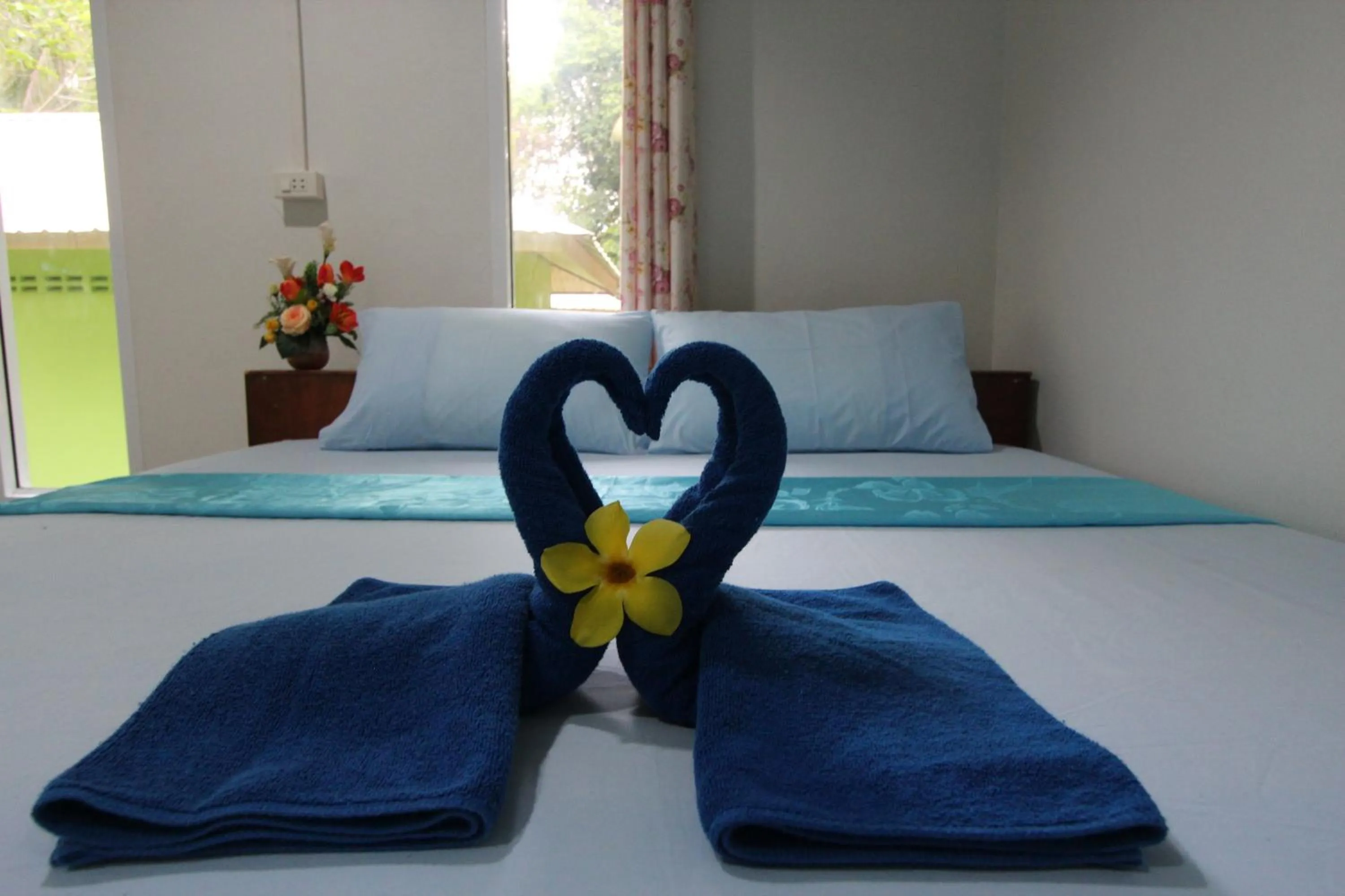 Bed in Koh Phayam Greentawan Resort