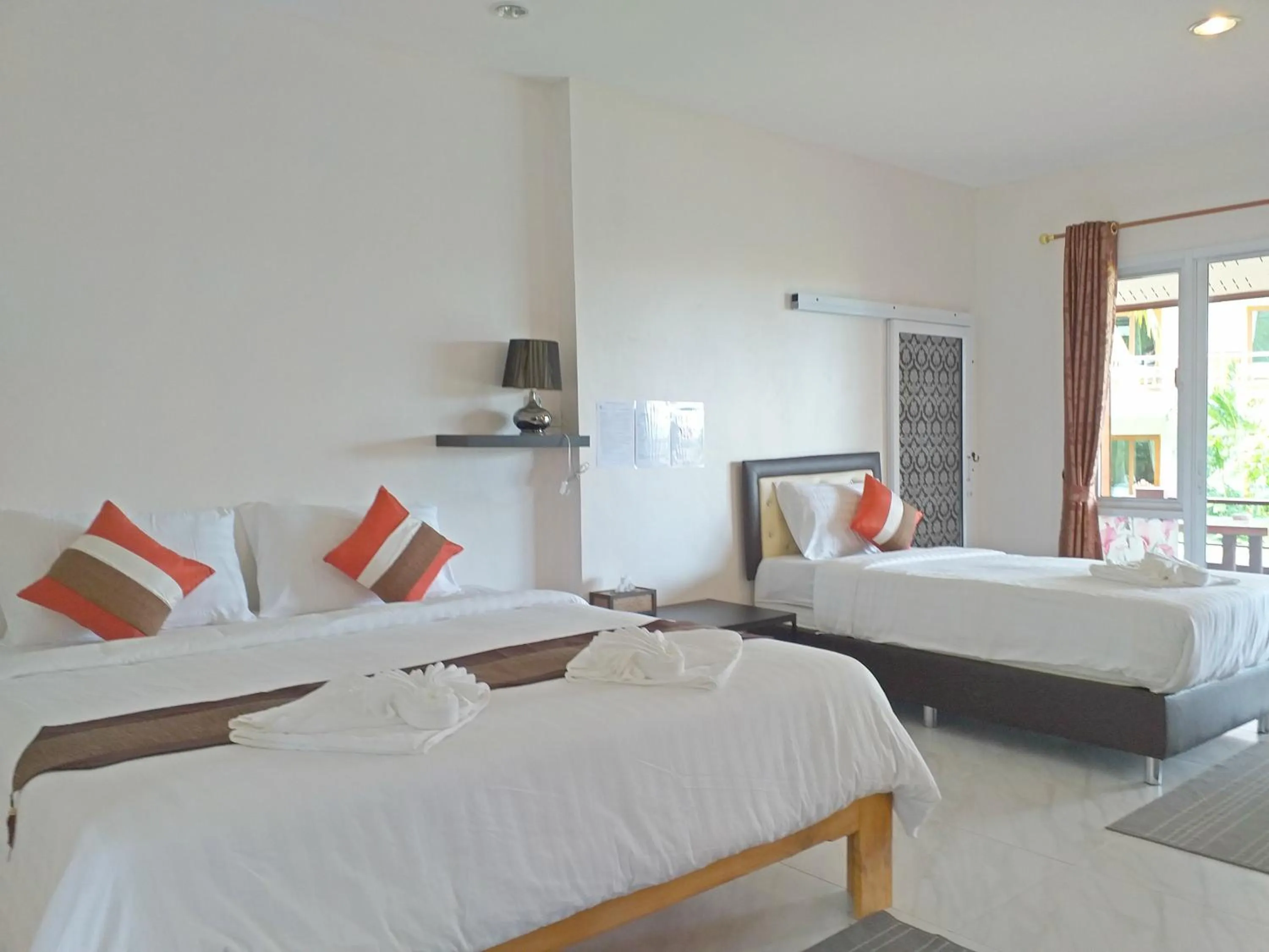 Bed in The Ford SunSet Beach Resort