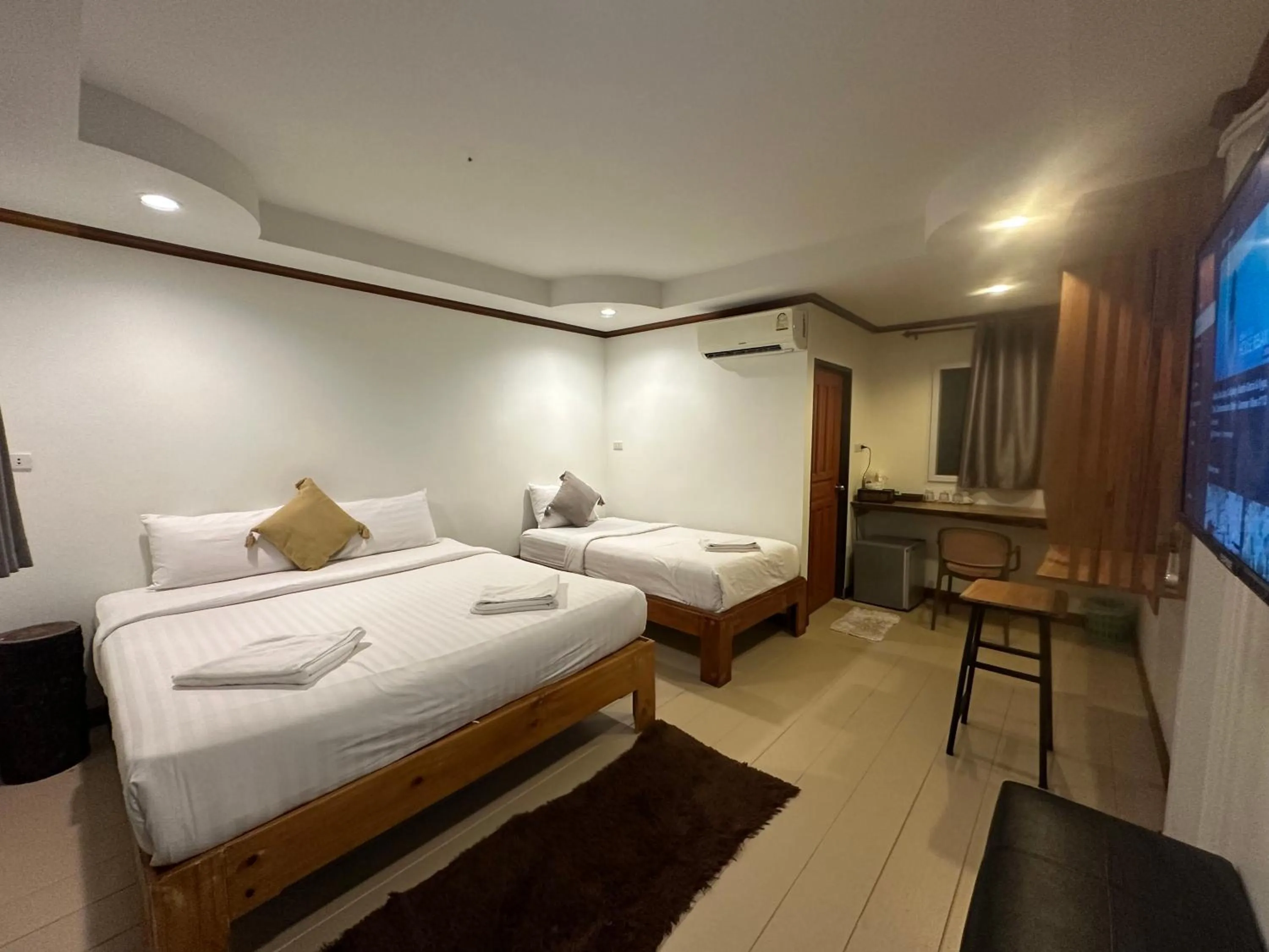 Bed in The Ford SunSet Beach Resort