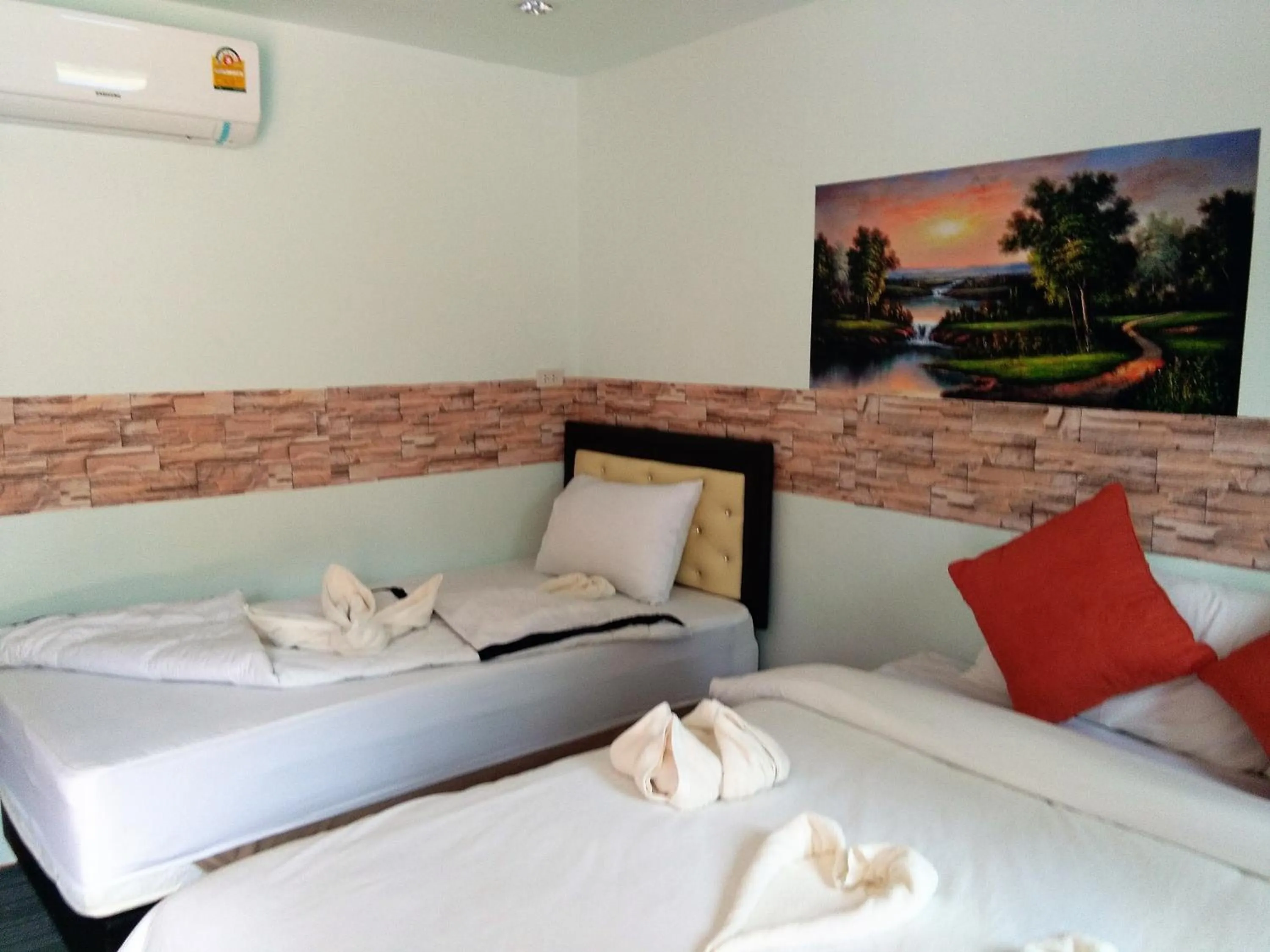 Bed in The Ford SunSet Beach Resort