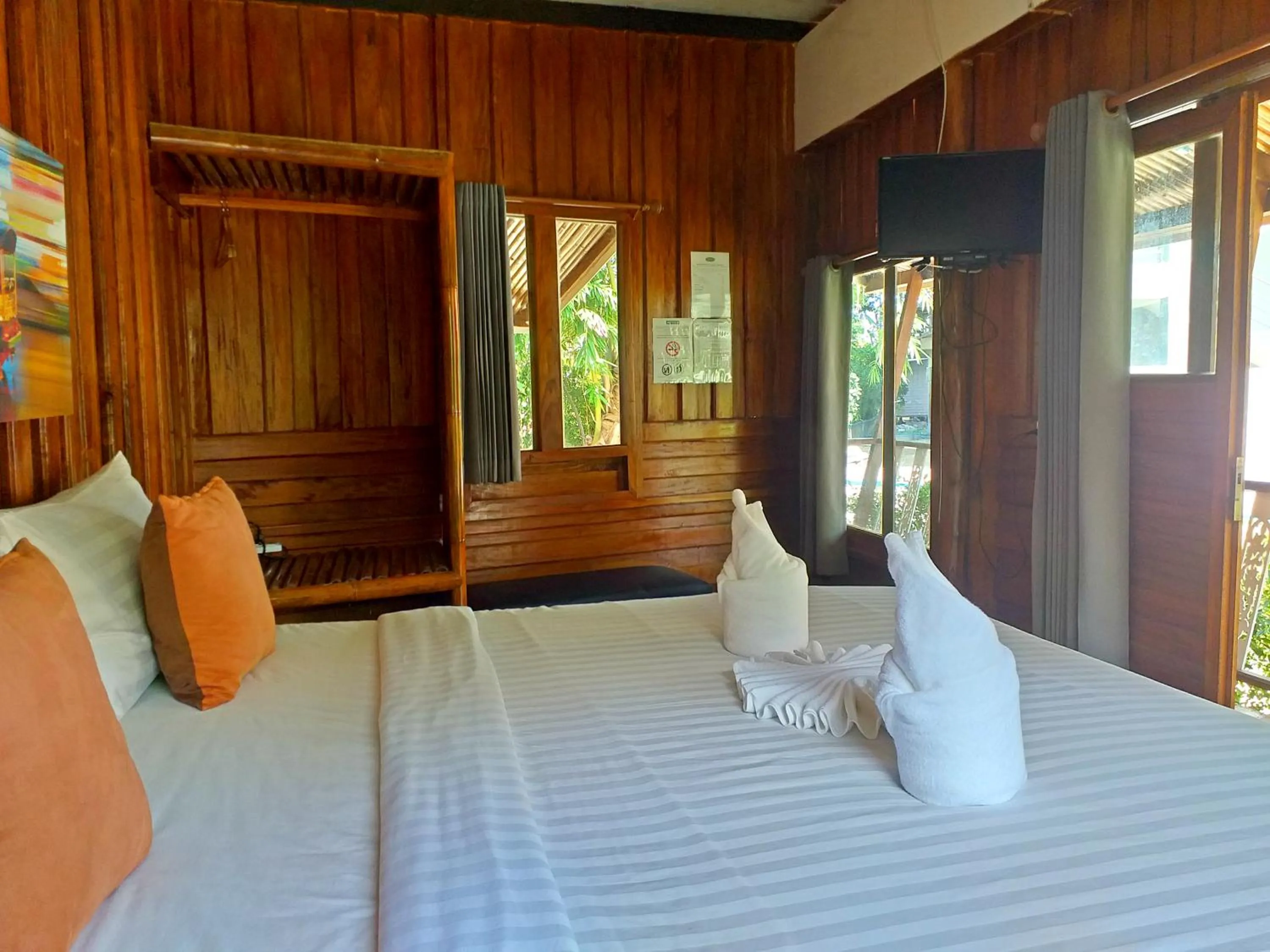 Bed in The Ford SunSet Beach Resort