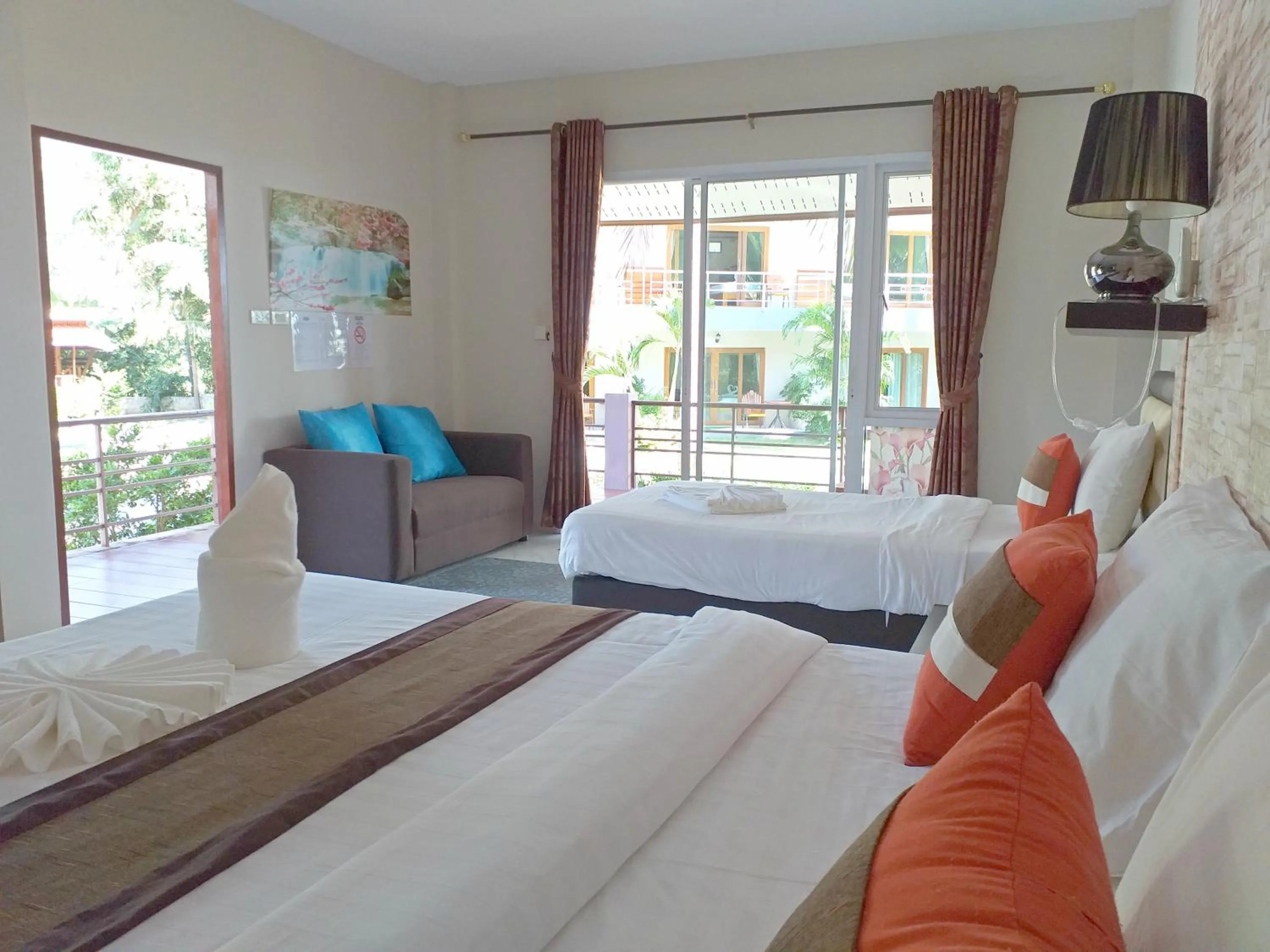 Bed in The Ford SunSet Beach Resort