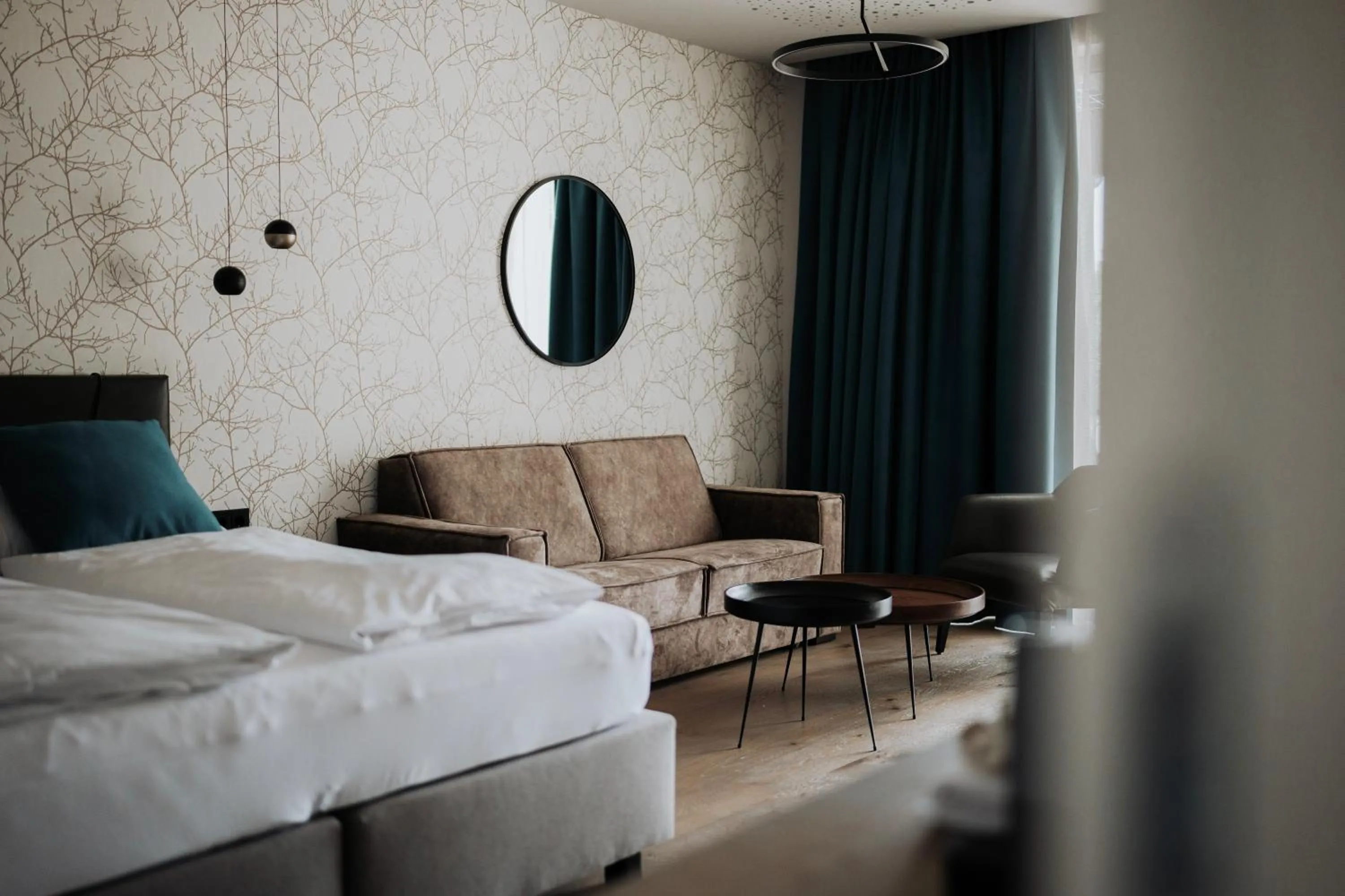 Living room, Bed in IKUNA Naturresort