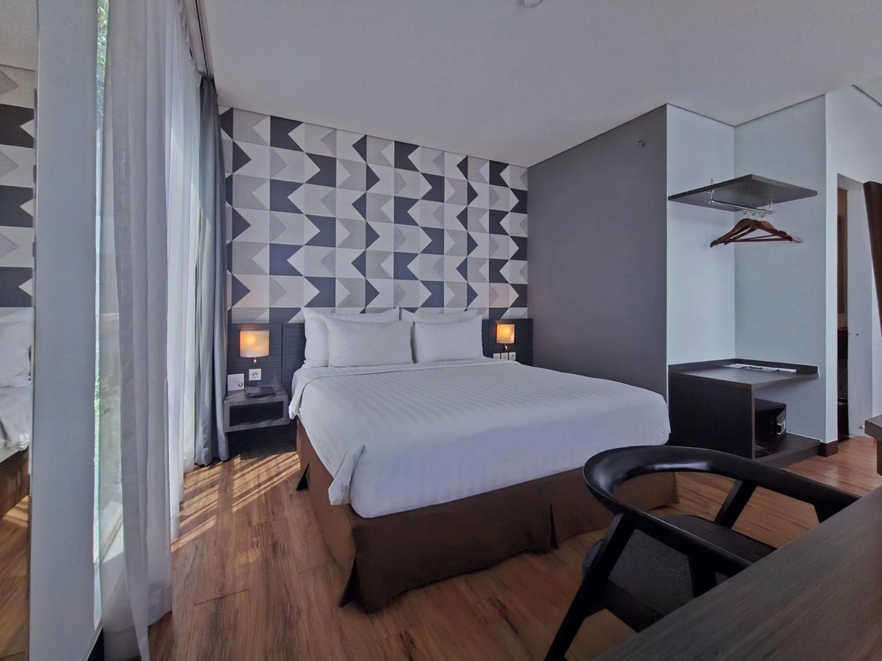 Bed in Luminor Hotel Jemursari By WH with The Best Breakfast in Town and Located Near Surabaya Industrial Estate Rungkut SIER